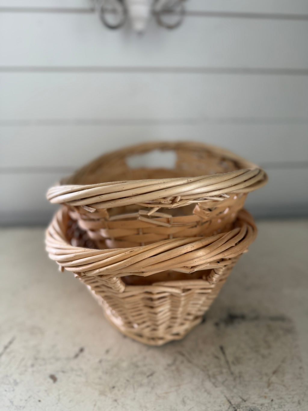 Set of small French style laundry baskets
