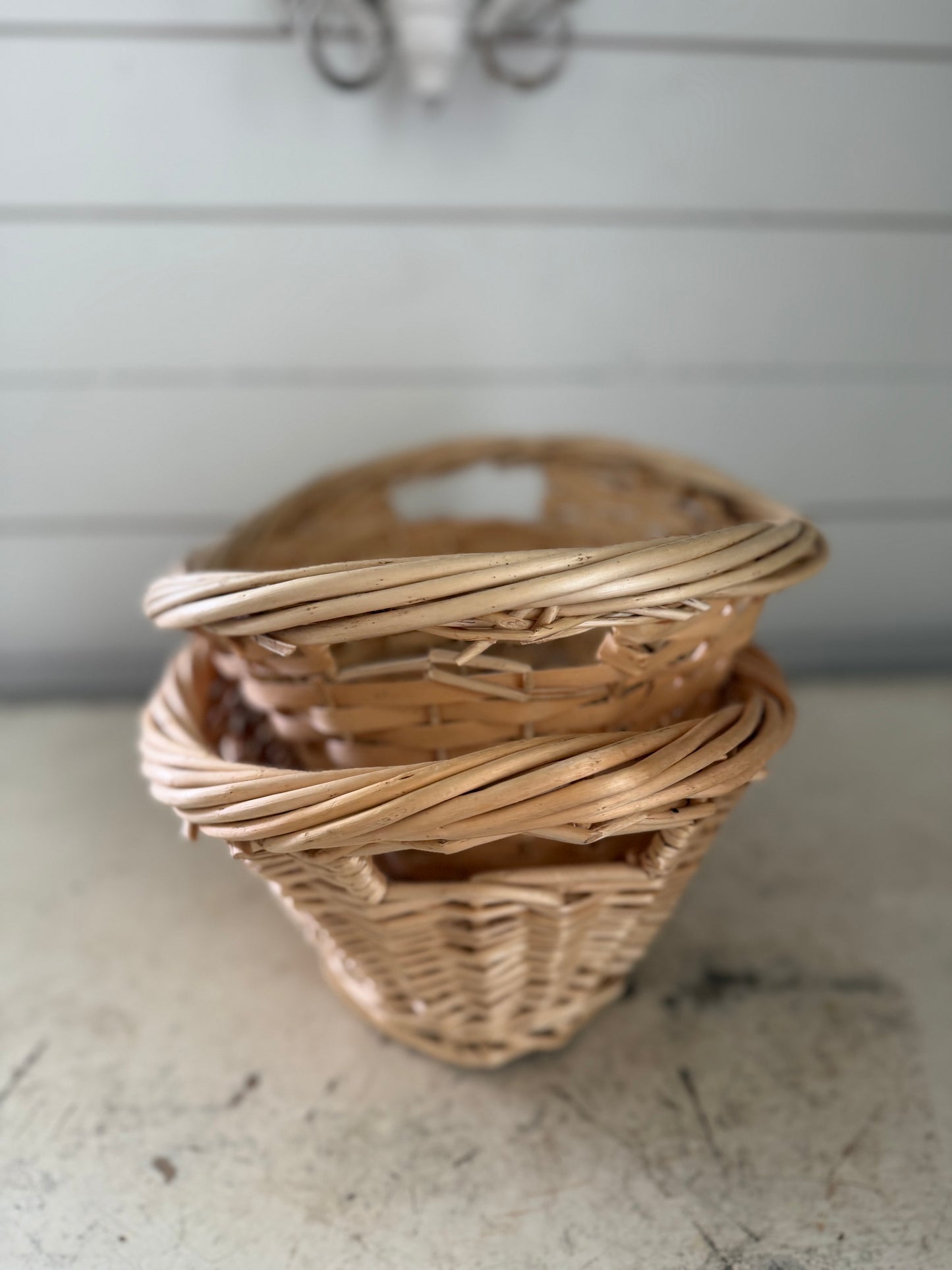 Set of small French style laundry baskets