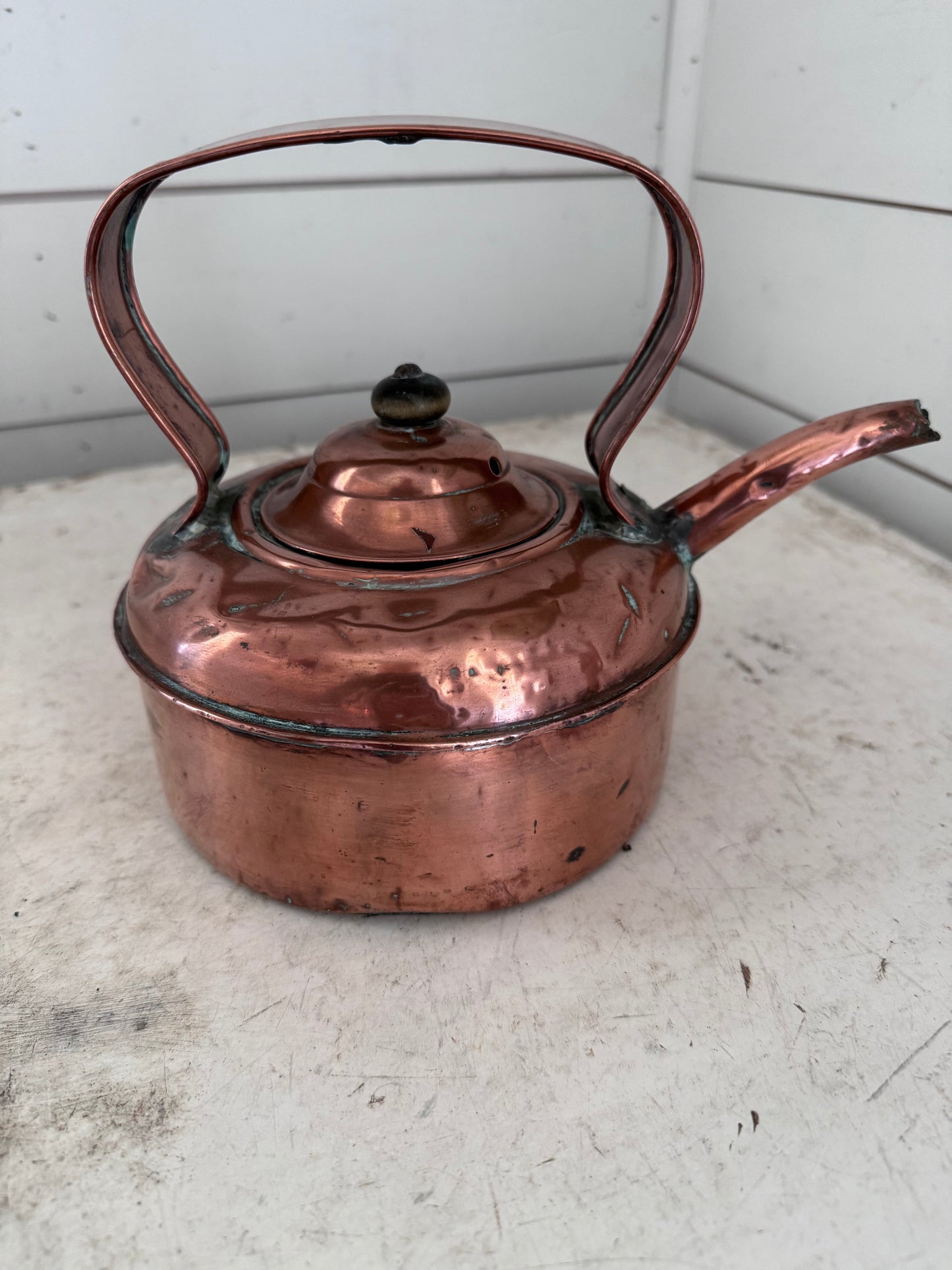 Copper kettle with flat copper strap handle