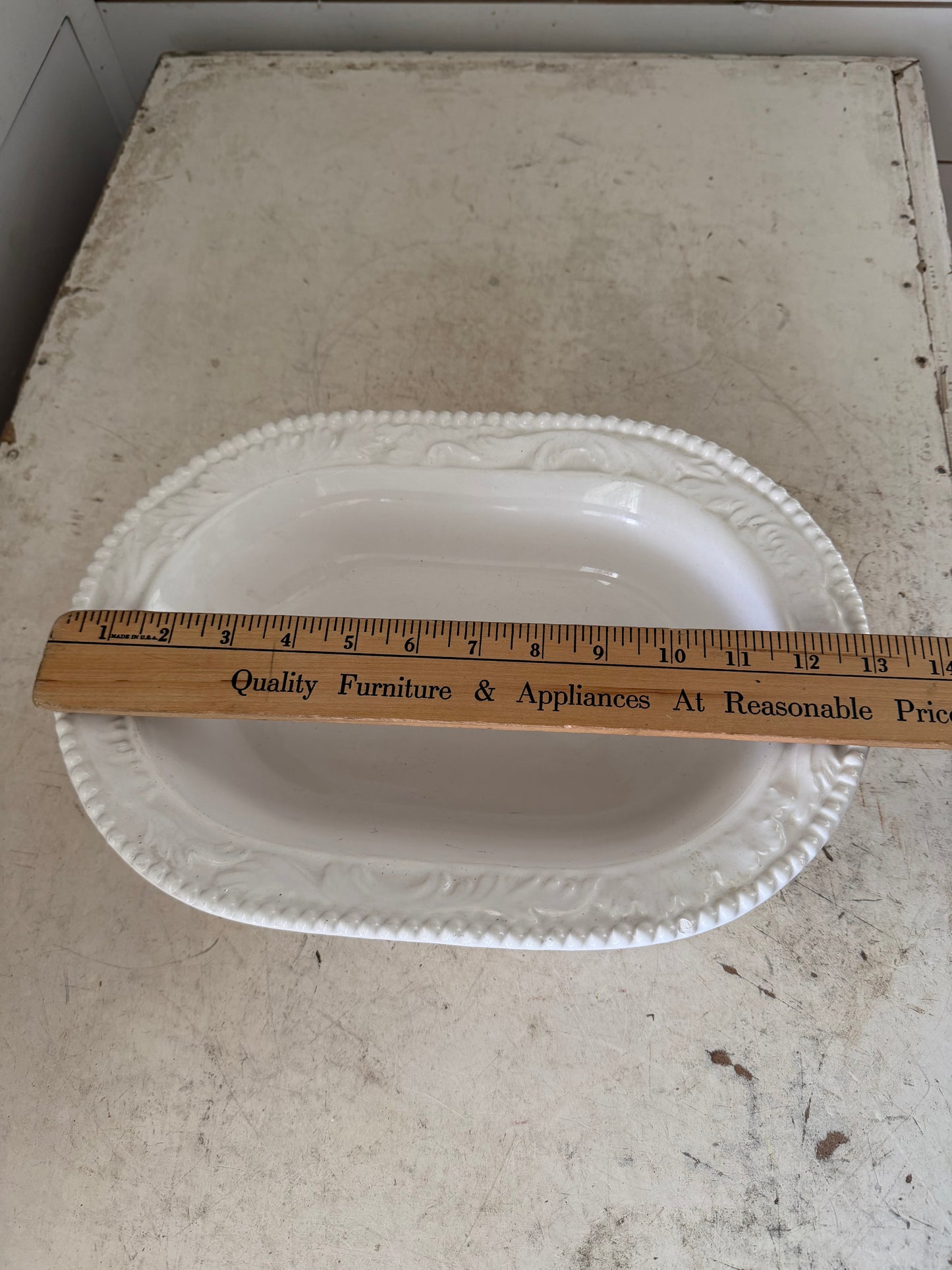 Vintage oval, ceramic serving dish made in Italy small chip
