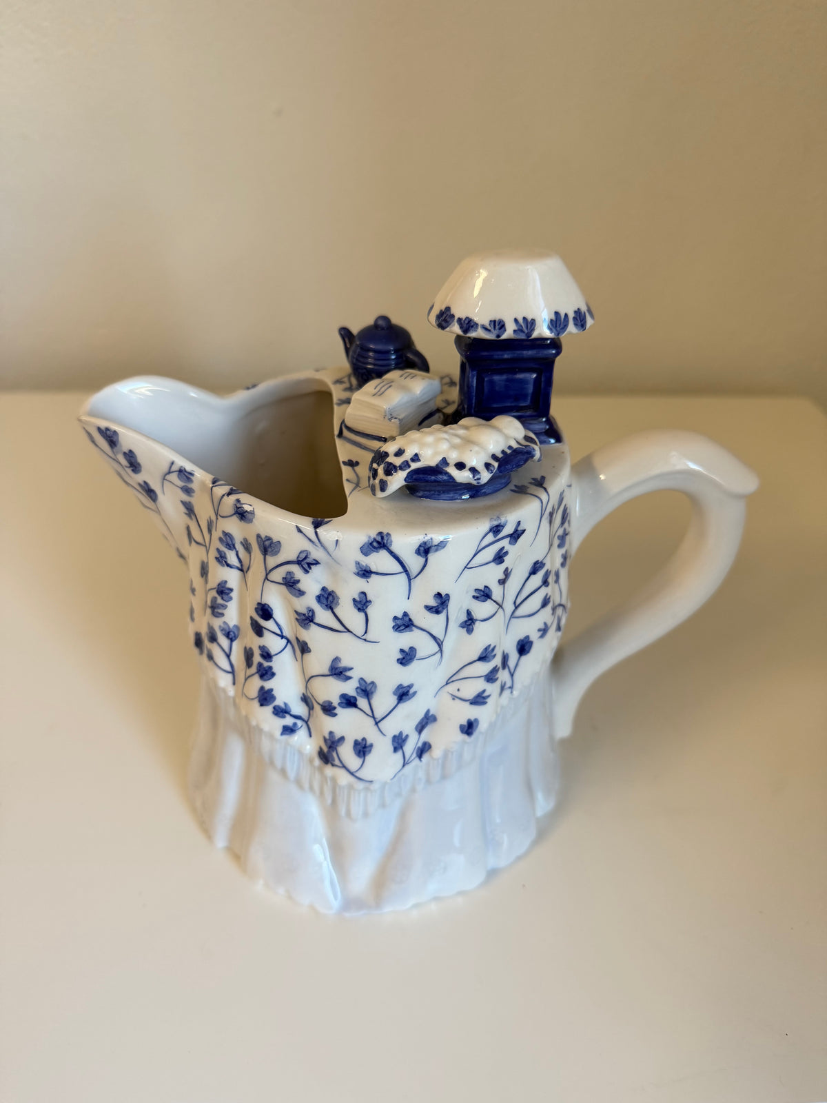vintage blue and white ceramic pitcher