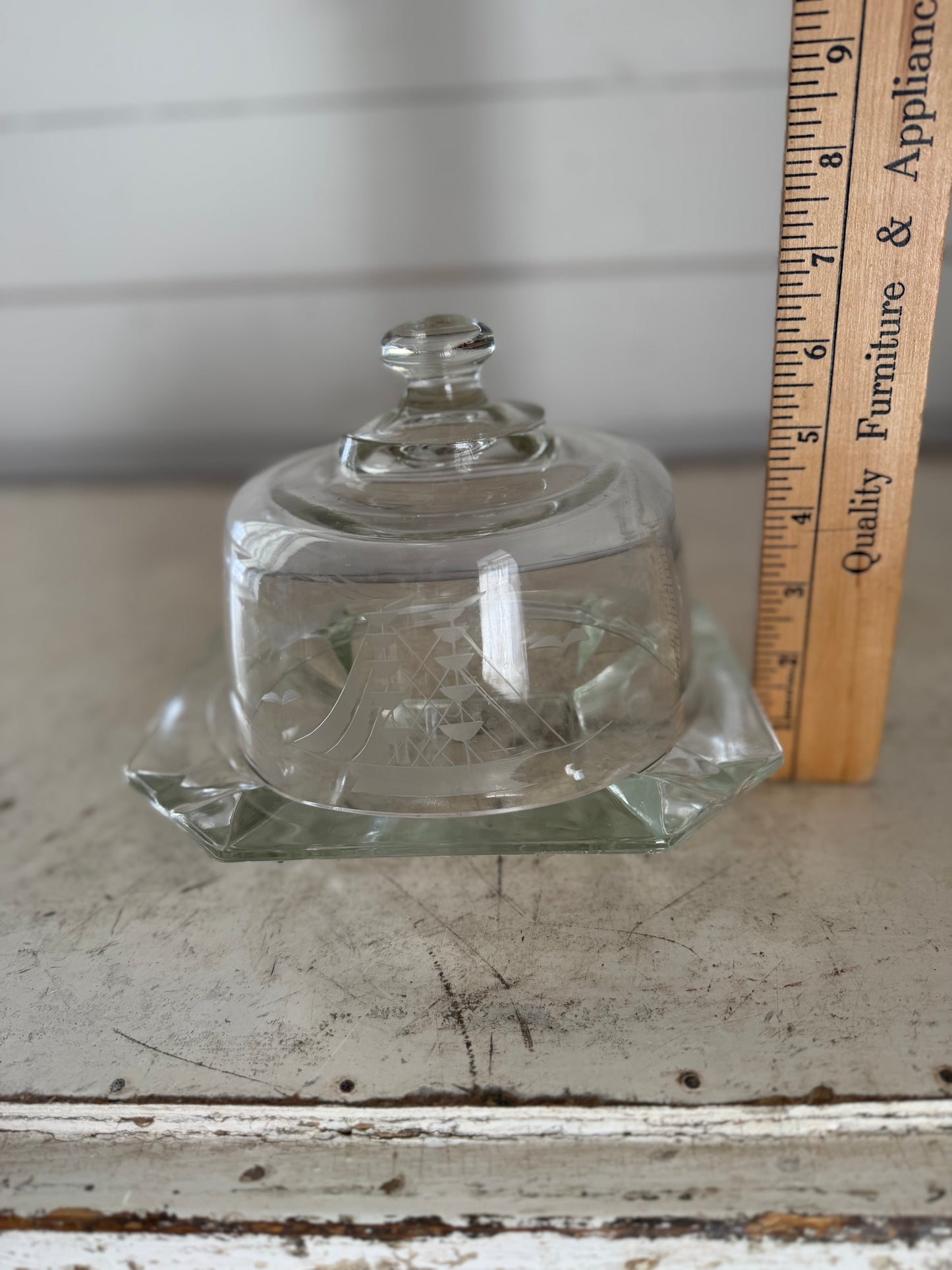 vintage glass dish with a domed lid, featuring a nautical clipper ship etched design