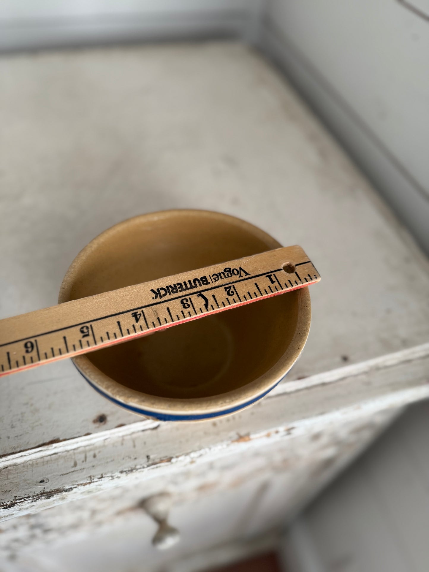 Small Yellowware crock bowl with blue stripe