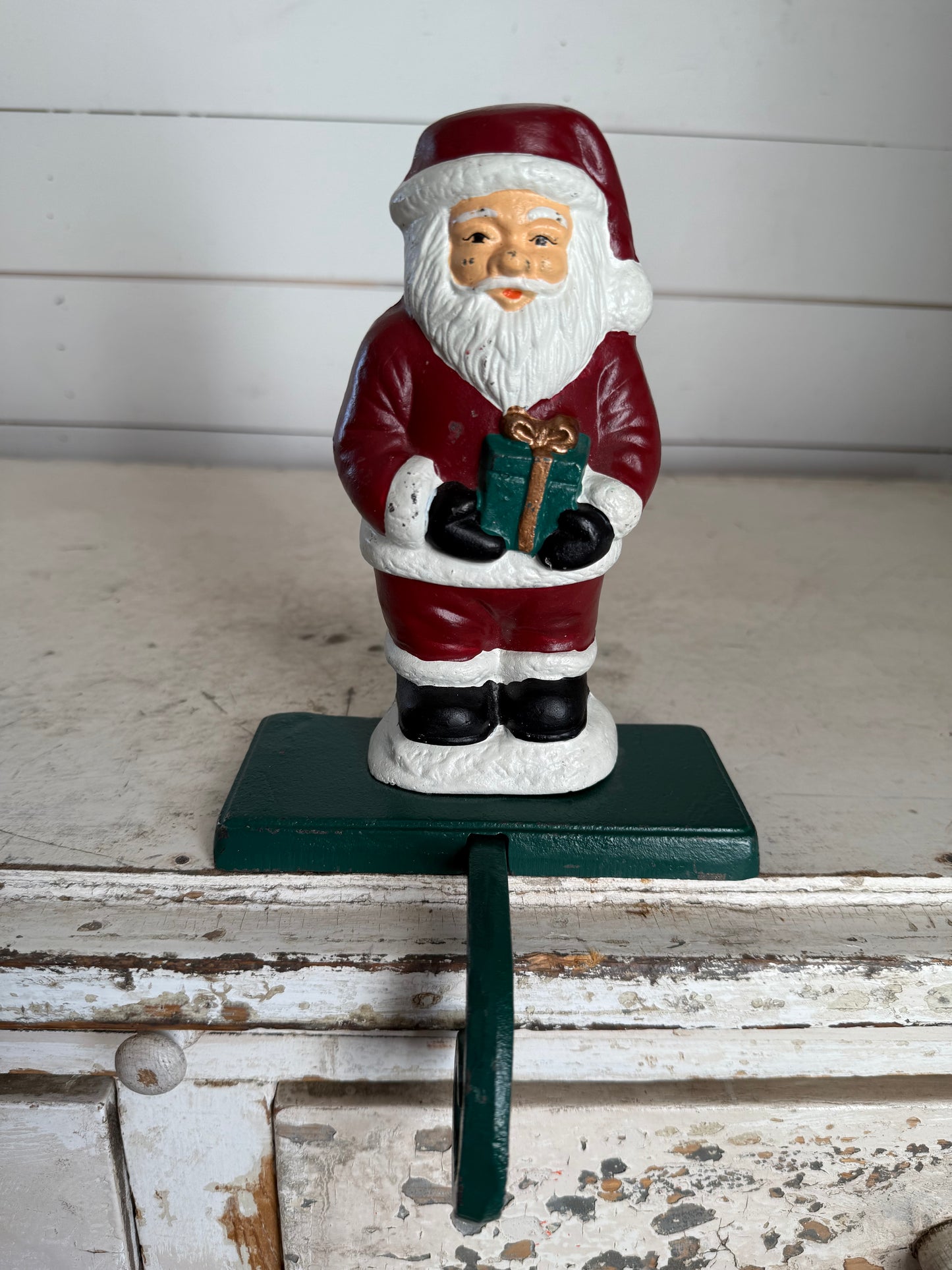 Vintage cast-iron Santa stocking hanger