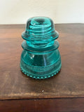 Antique blue green insulator