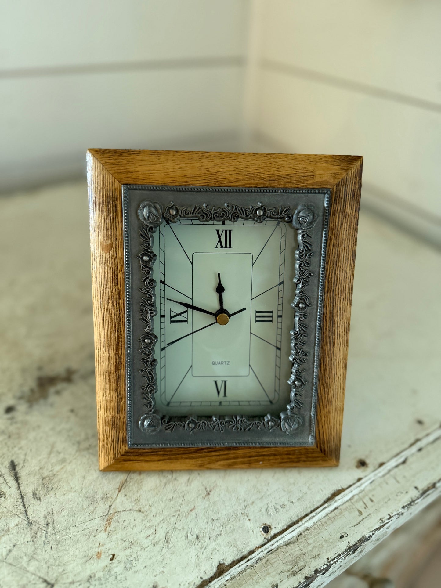 Wood and rose wood framed clock