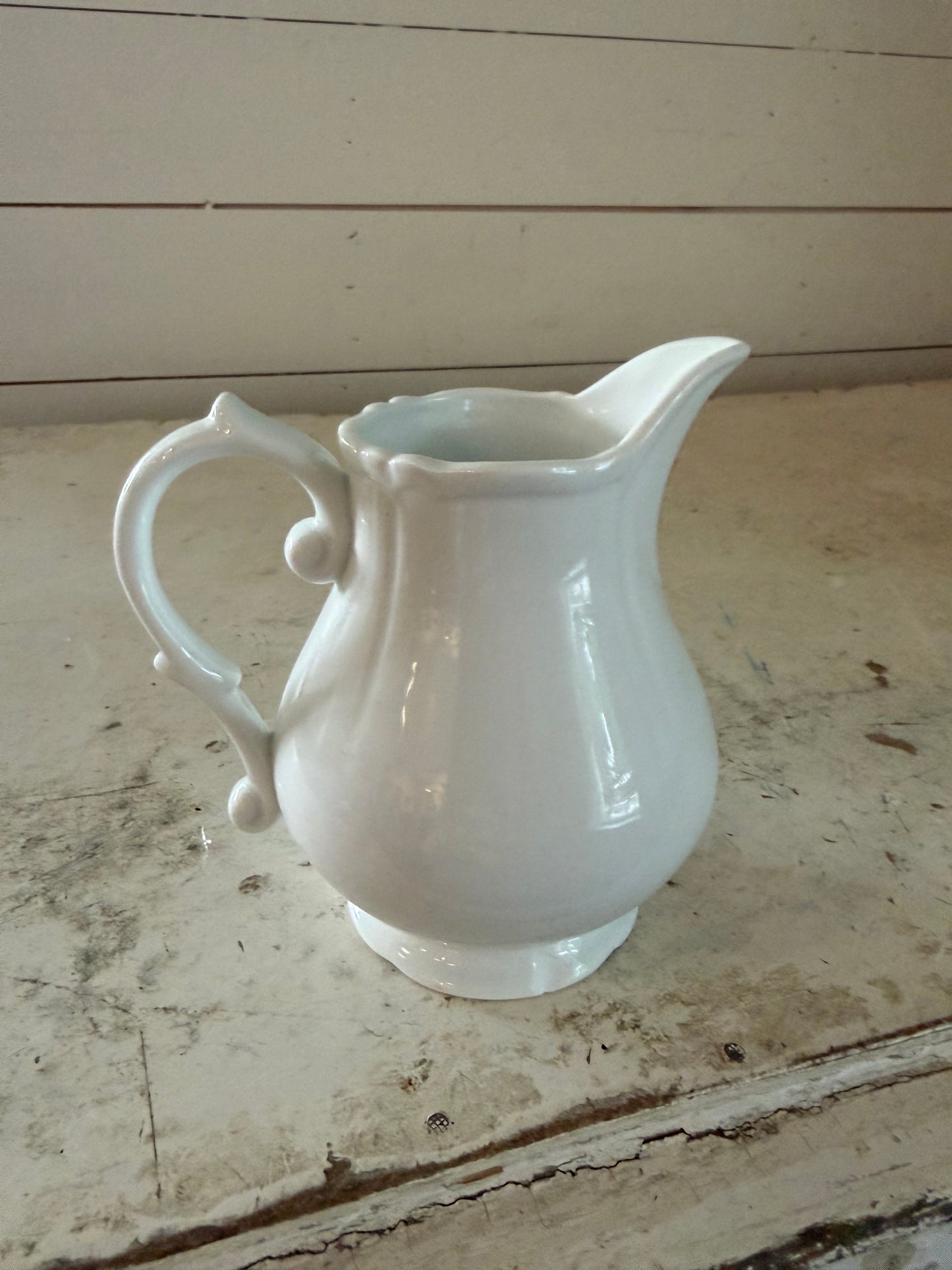 White ceramic creamer