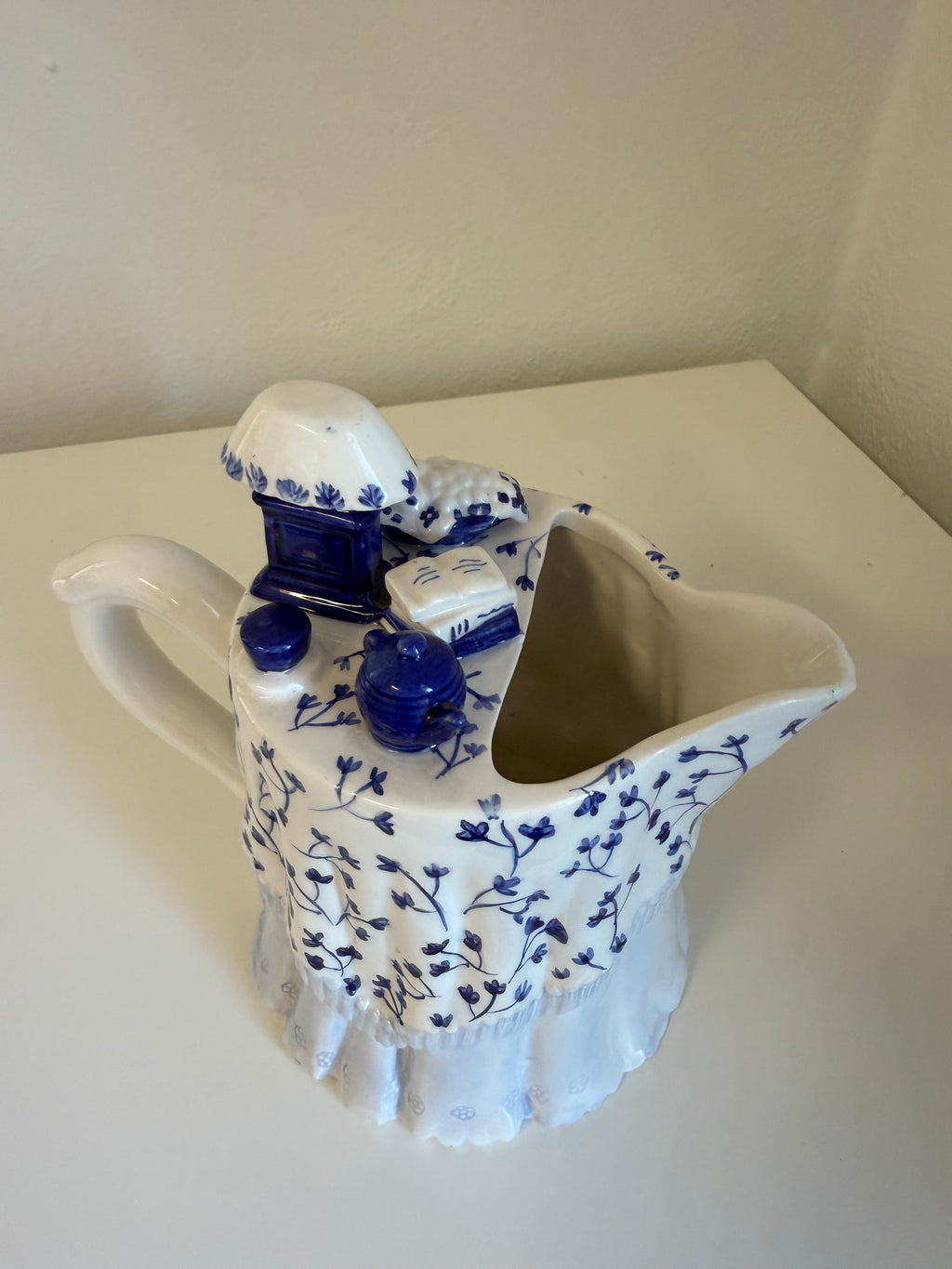 vintage blue and white ceramic pitcher