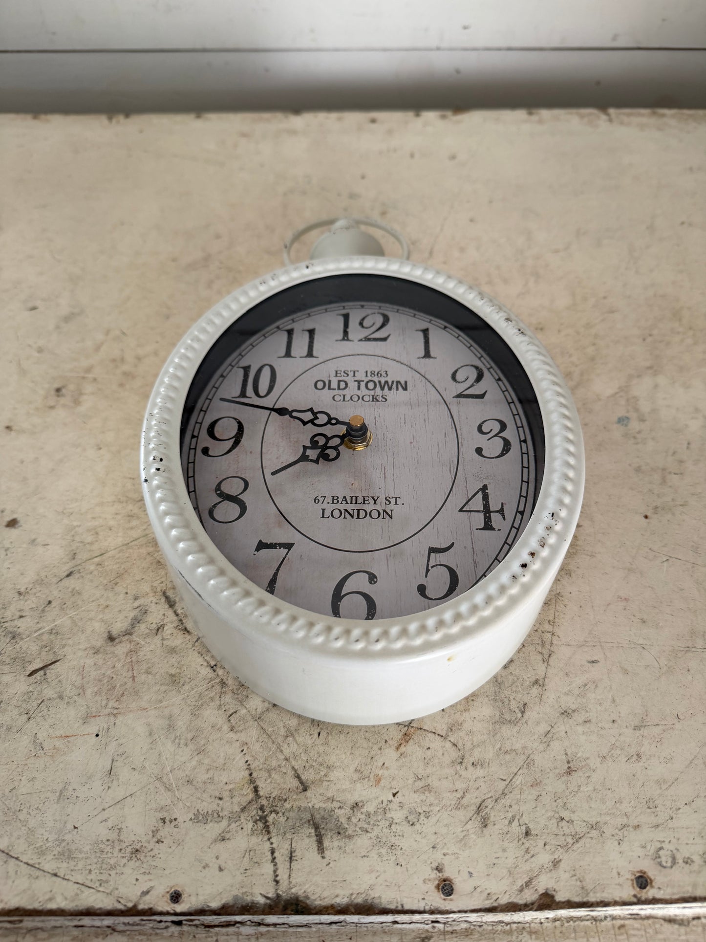 Small white Metal oval clock - will get makeover