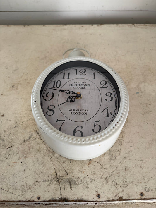 Small white Metal oval clock - will get makeover
