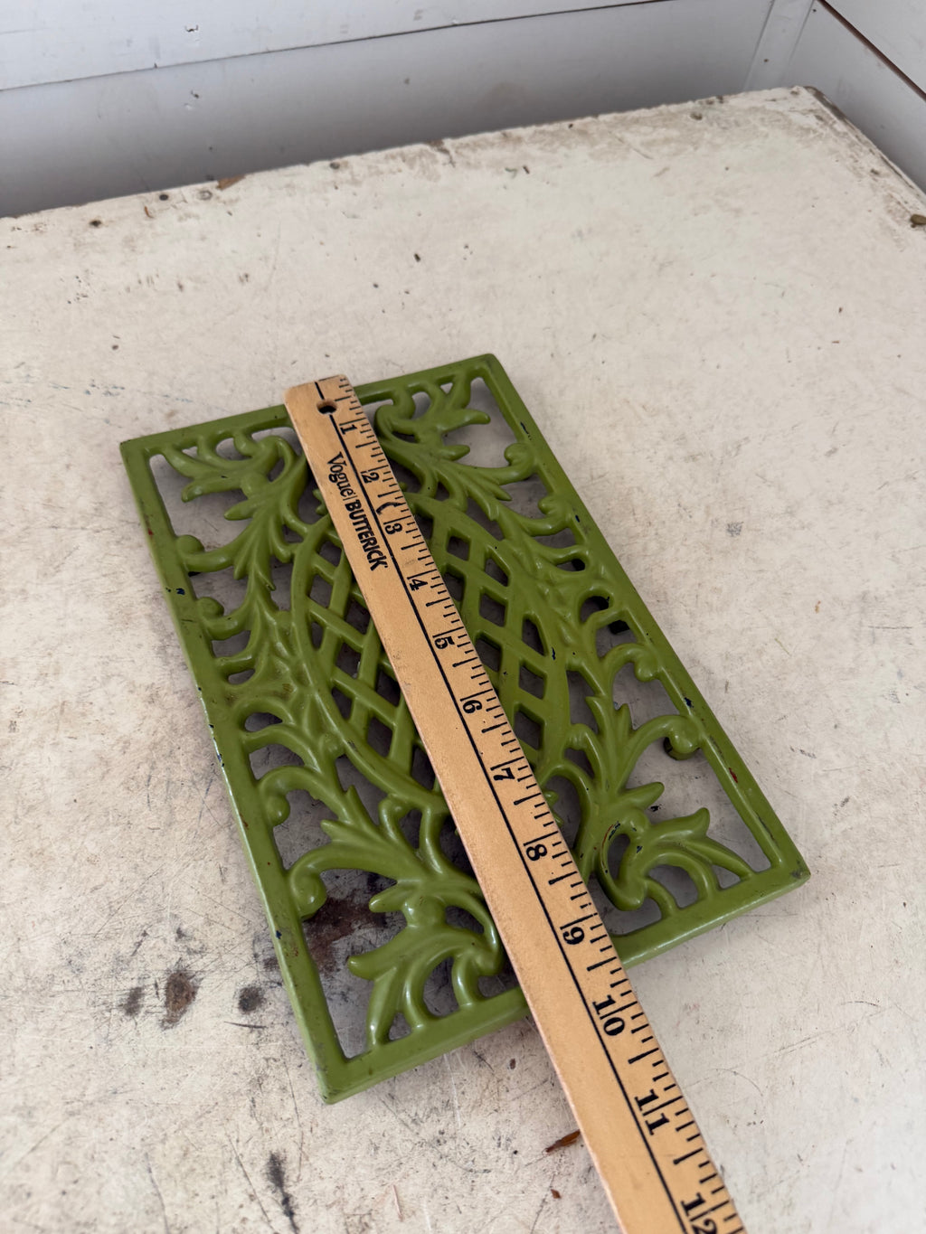 Green cast-iron trivet