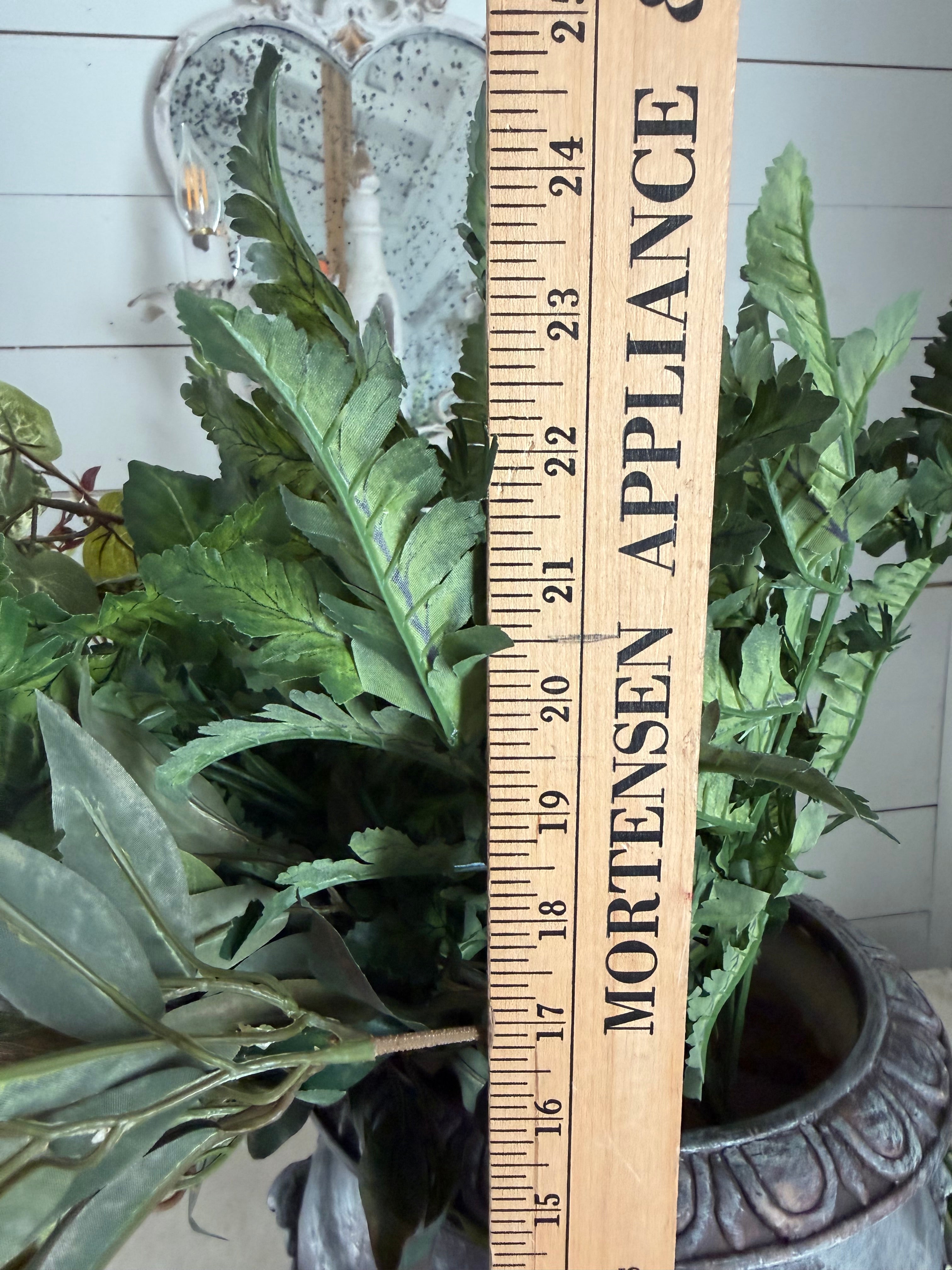 Urn with greenery included