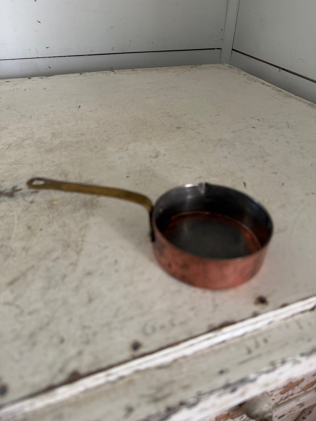 Mini copper sauce pan with sprout more like the size of a measuring cup