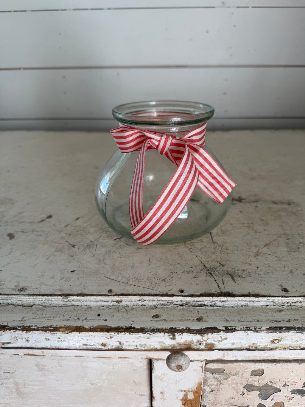 Vintage Green Glass Style Vase with red and white ribbon