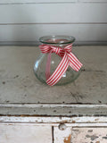 Vintage Green Glass Style Vase with red and white ribbon