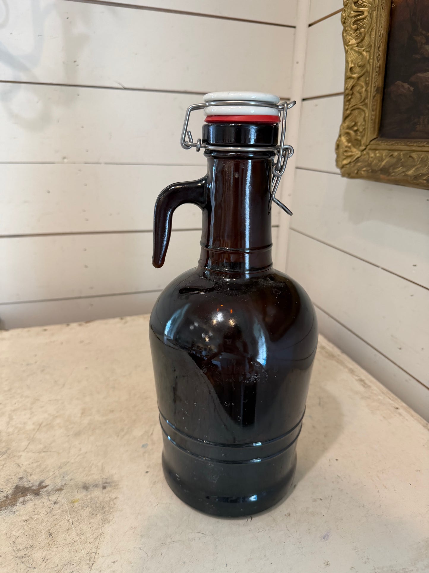 Amber beer growler with porcelain lid