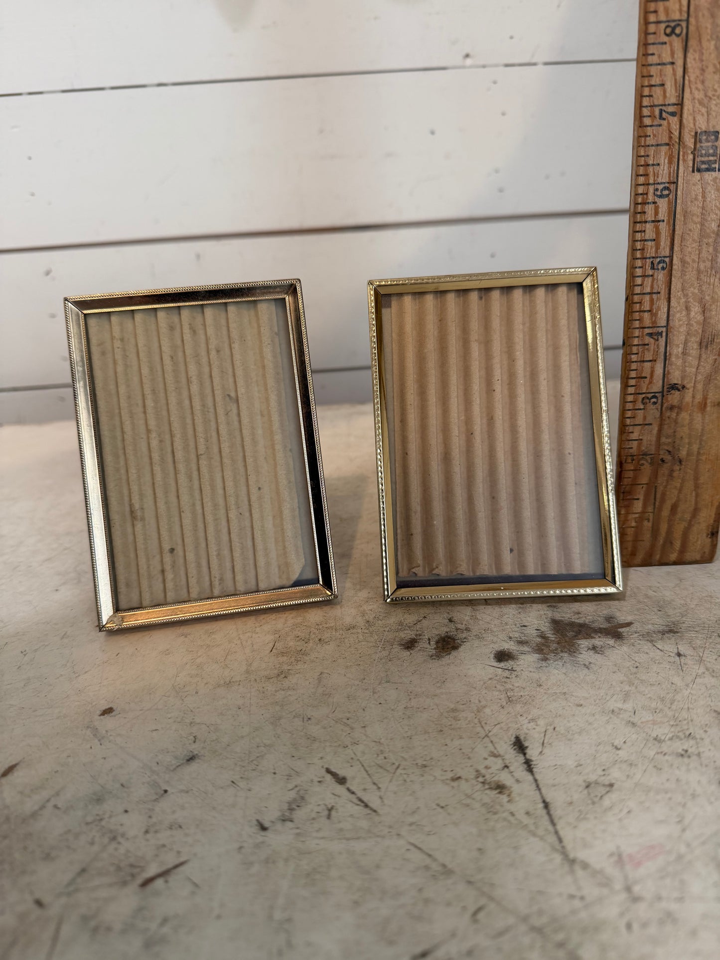 Set a small brass frames - will get art