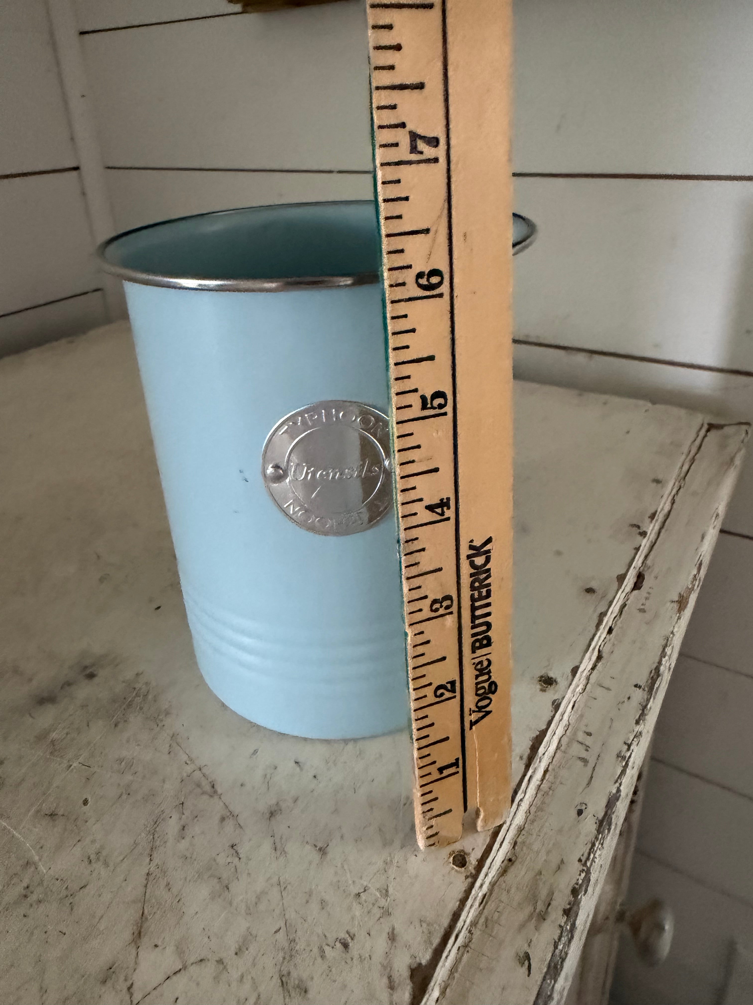 Light blue enamel utensil holder will get transferred