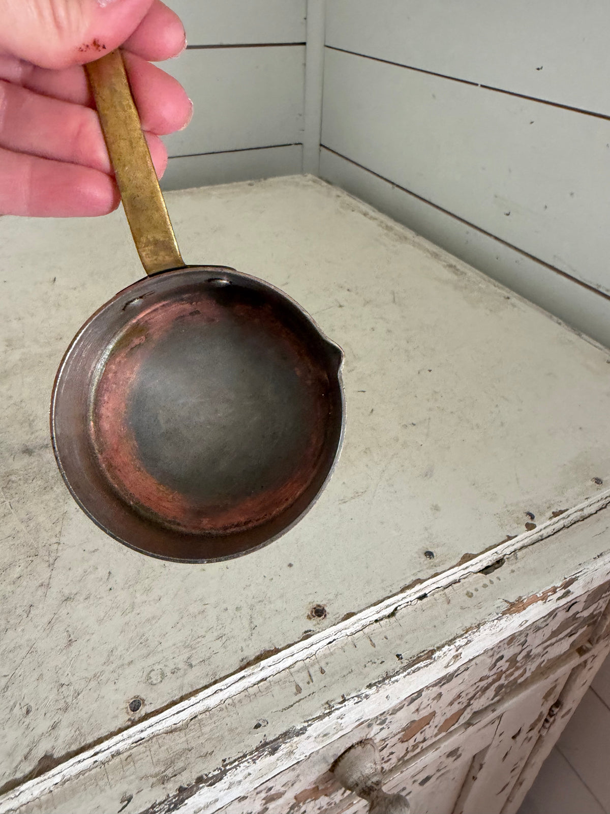 Mini copper sauce pan with sprout more like the size of a measuring cup