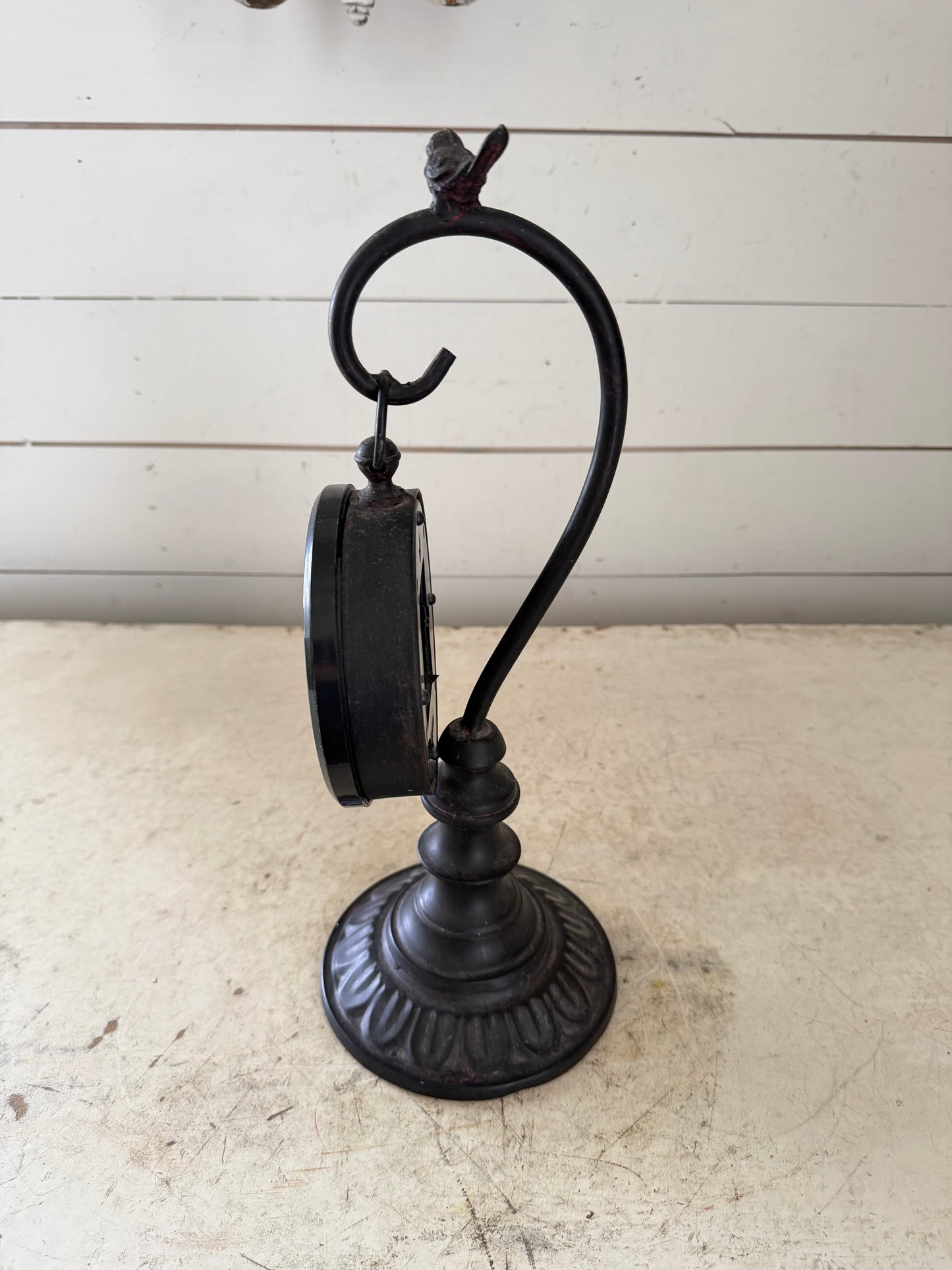 Pocket watch on a stand with a bird on top clock will get makeover