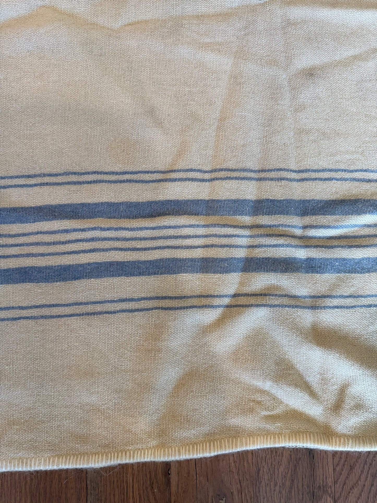 Cream wool blanket with blue stripes, twin size