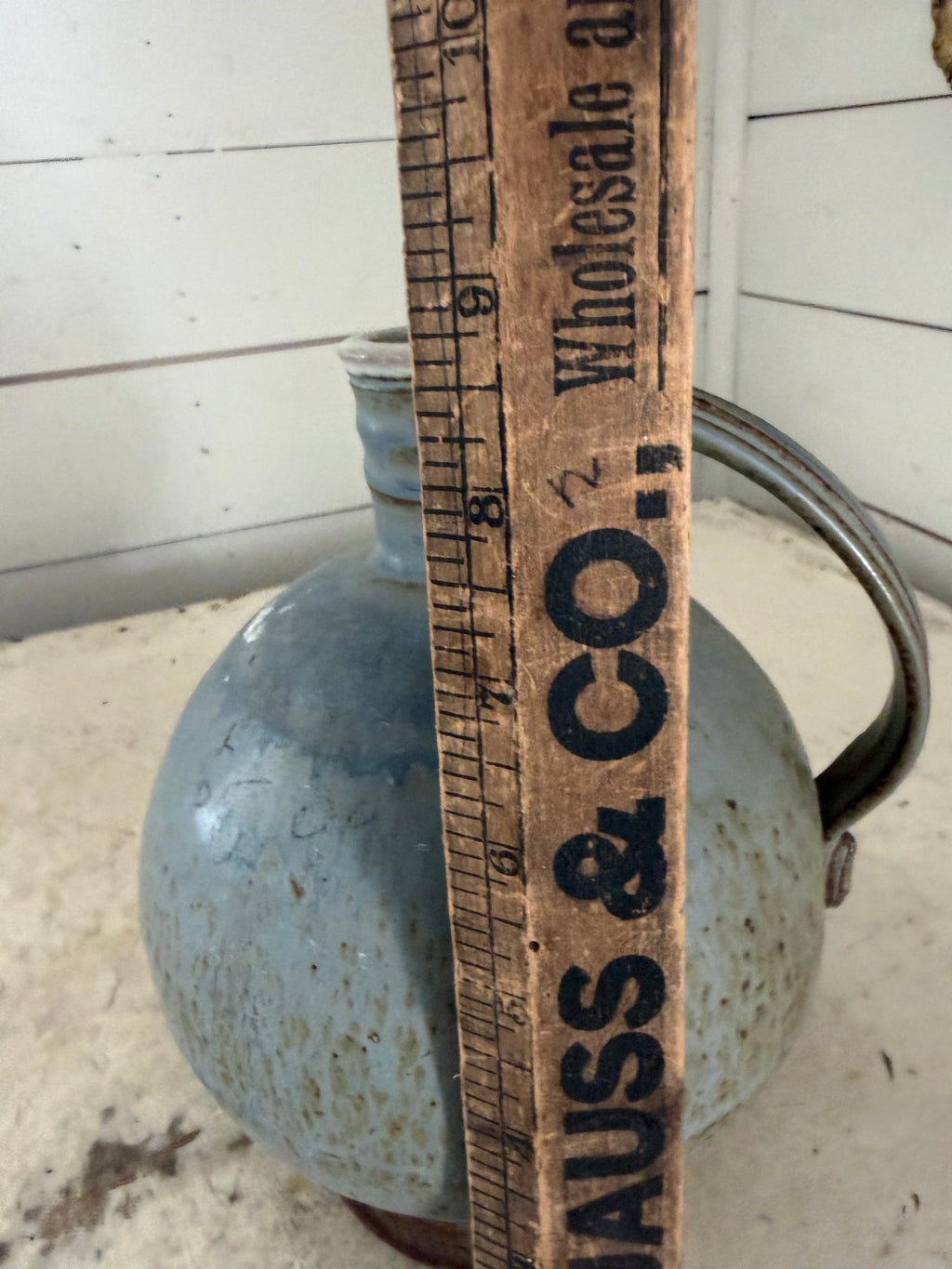 Vintage pottery studio jug has chips at base as shown