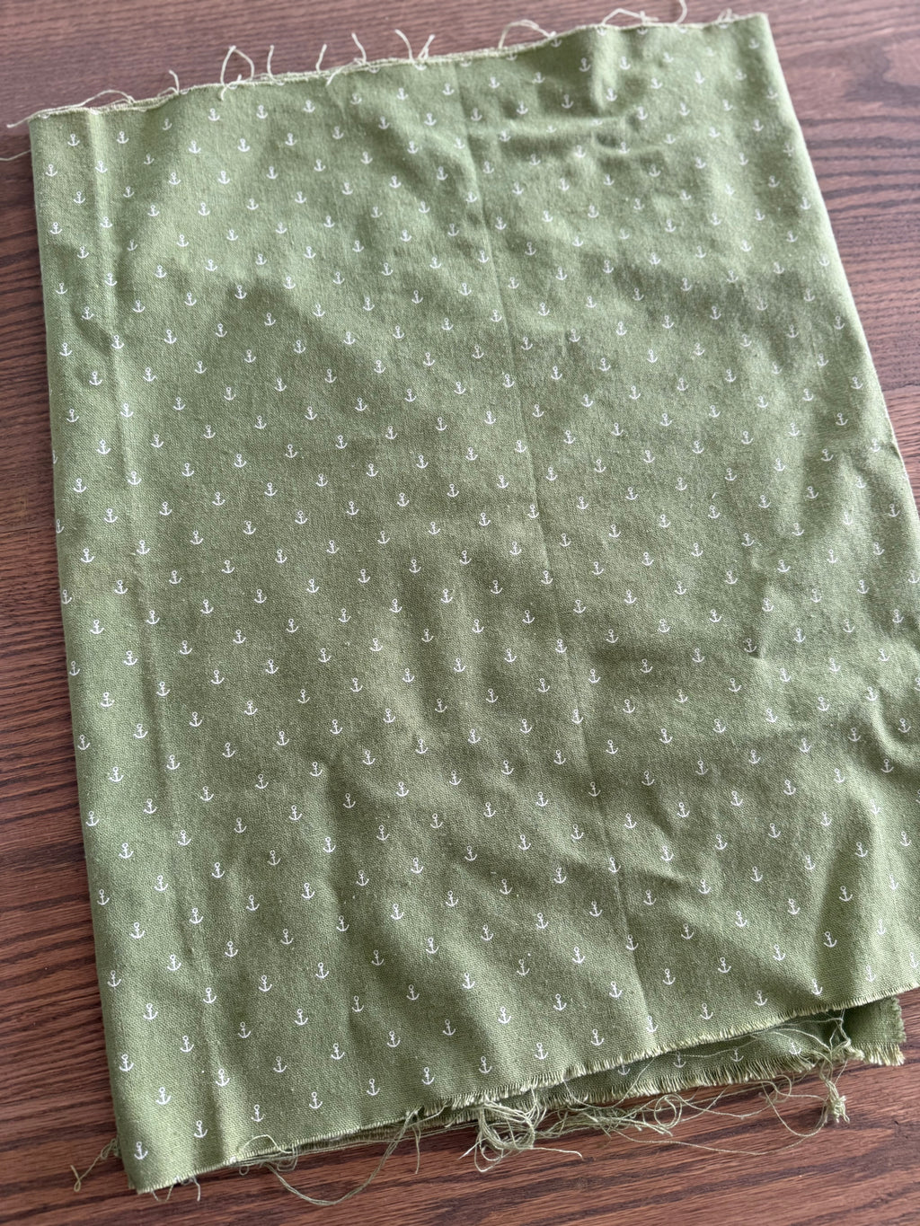 20 inches green fabric with little anchors
