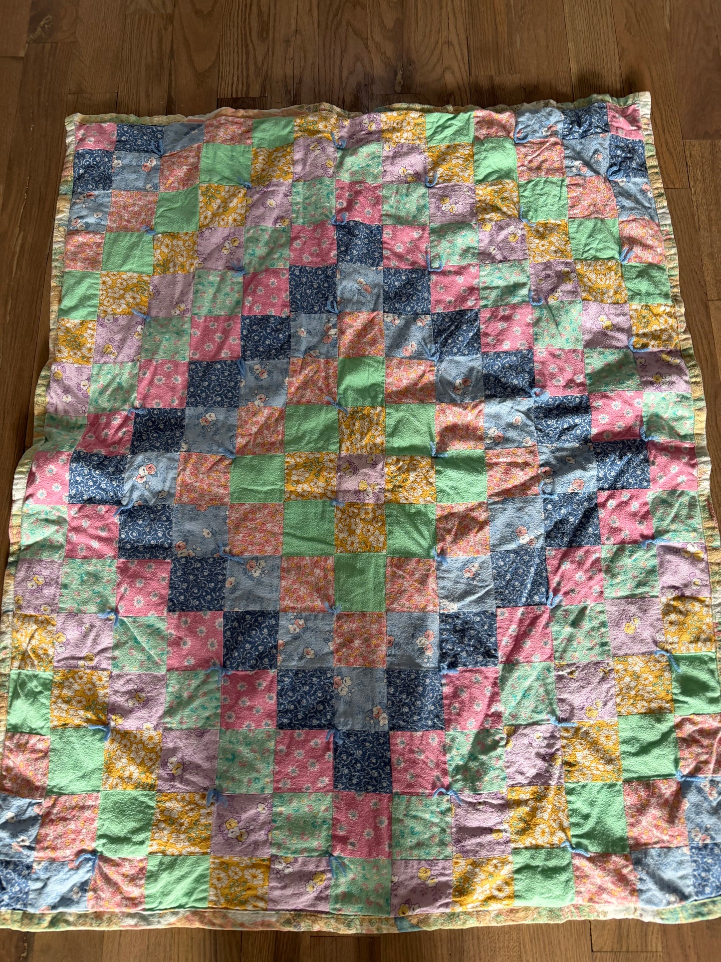 Pieced baby blanket quilt with Peter rabbit backer