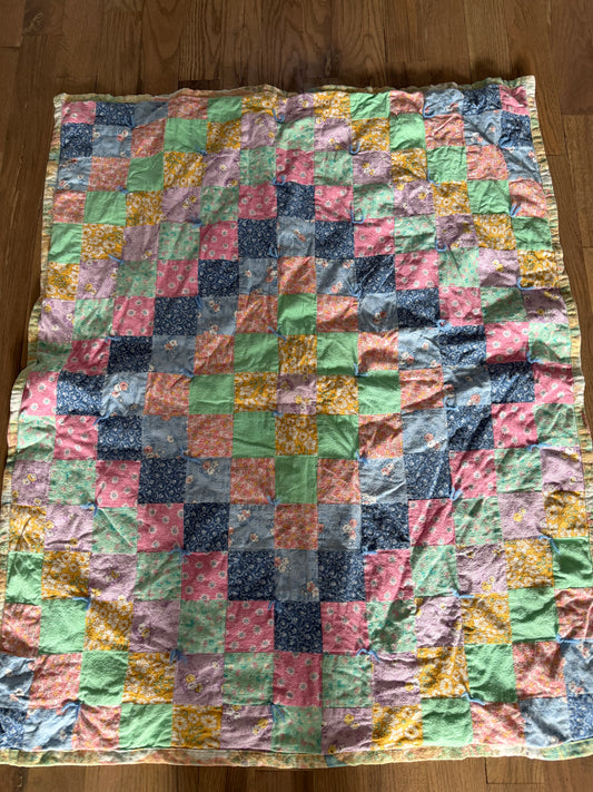 Pieced baby blanket quilt with Peter rabbit backer