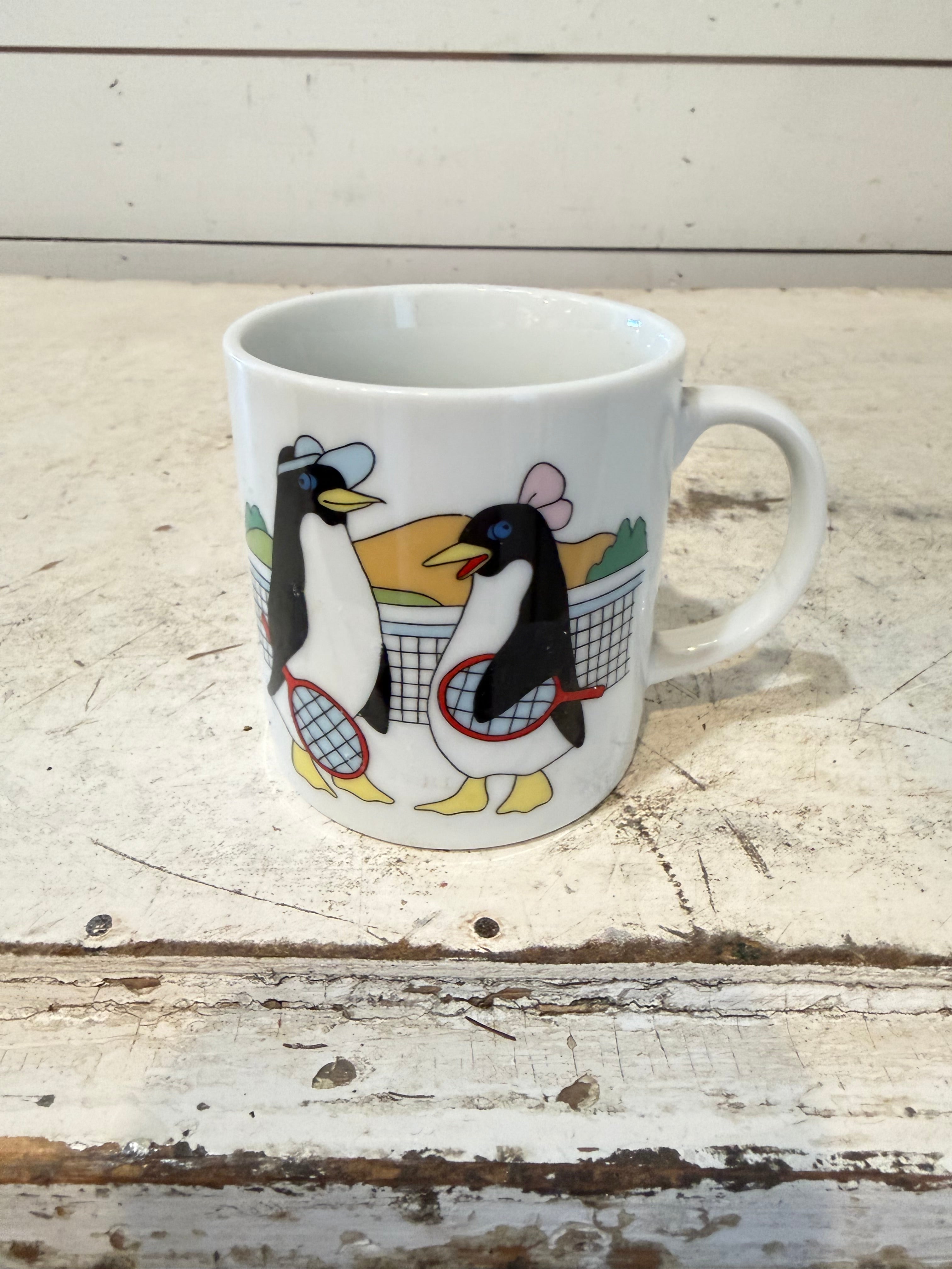 Vintage Cartoon Penguin mug - Playing Tennis