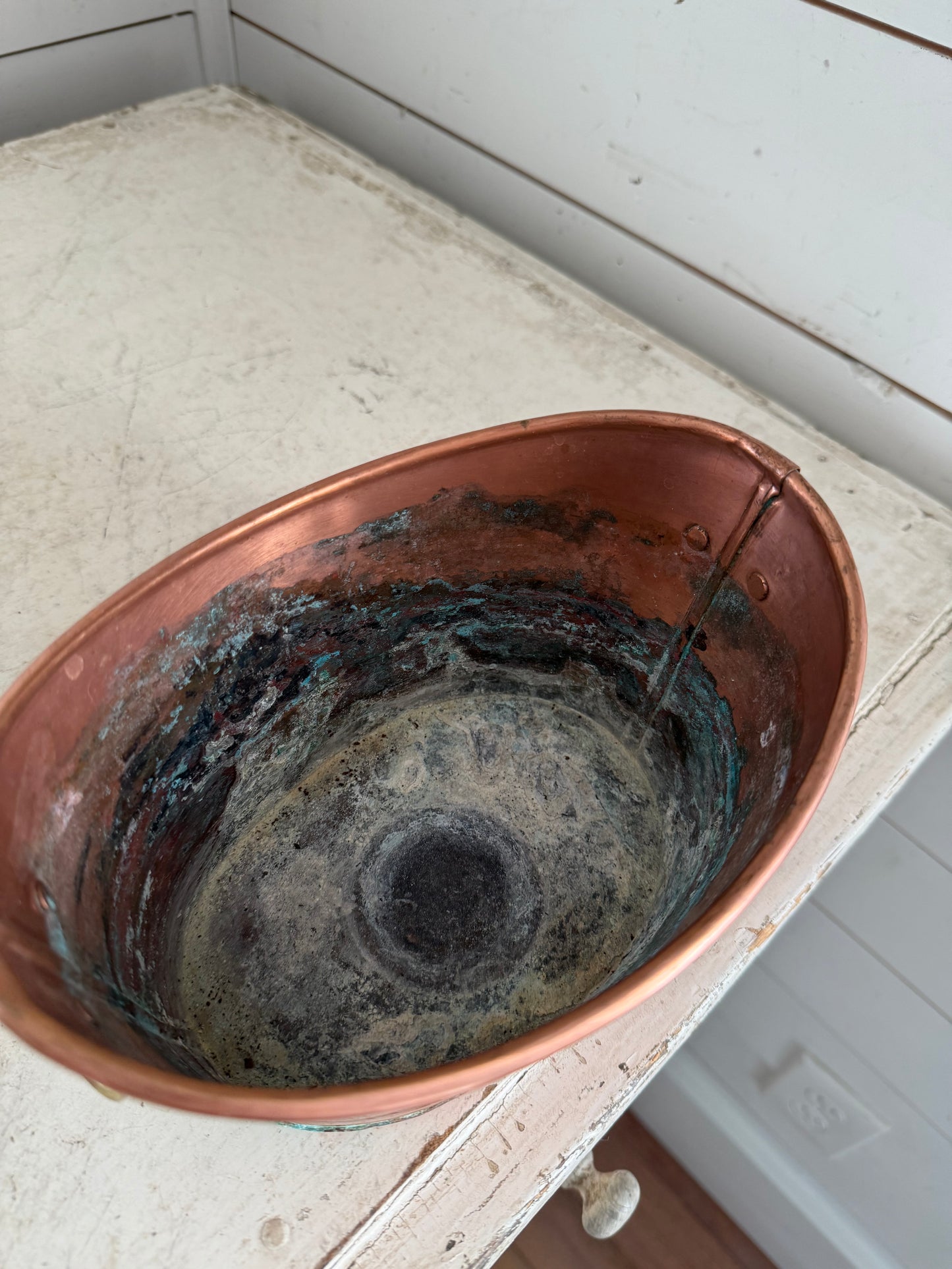 Vintage copper bucket with brass lion handles