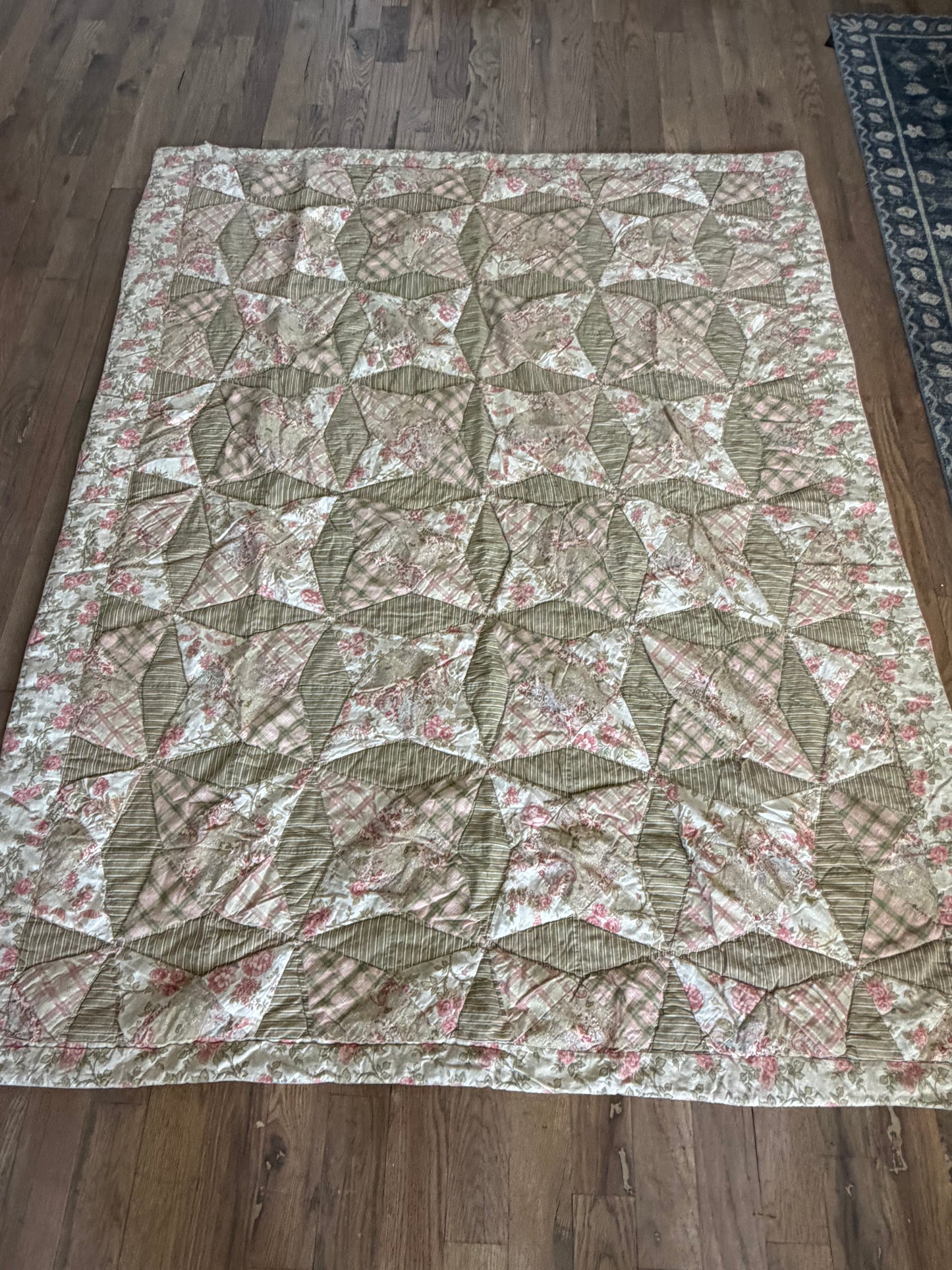 Shabby floral quilt hand stitching, not homemade as is