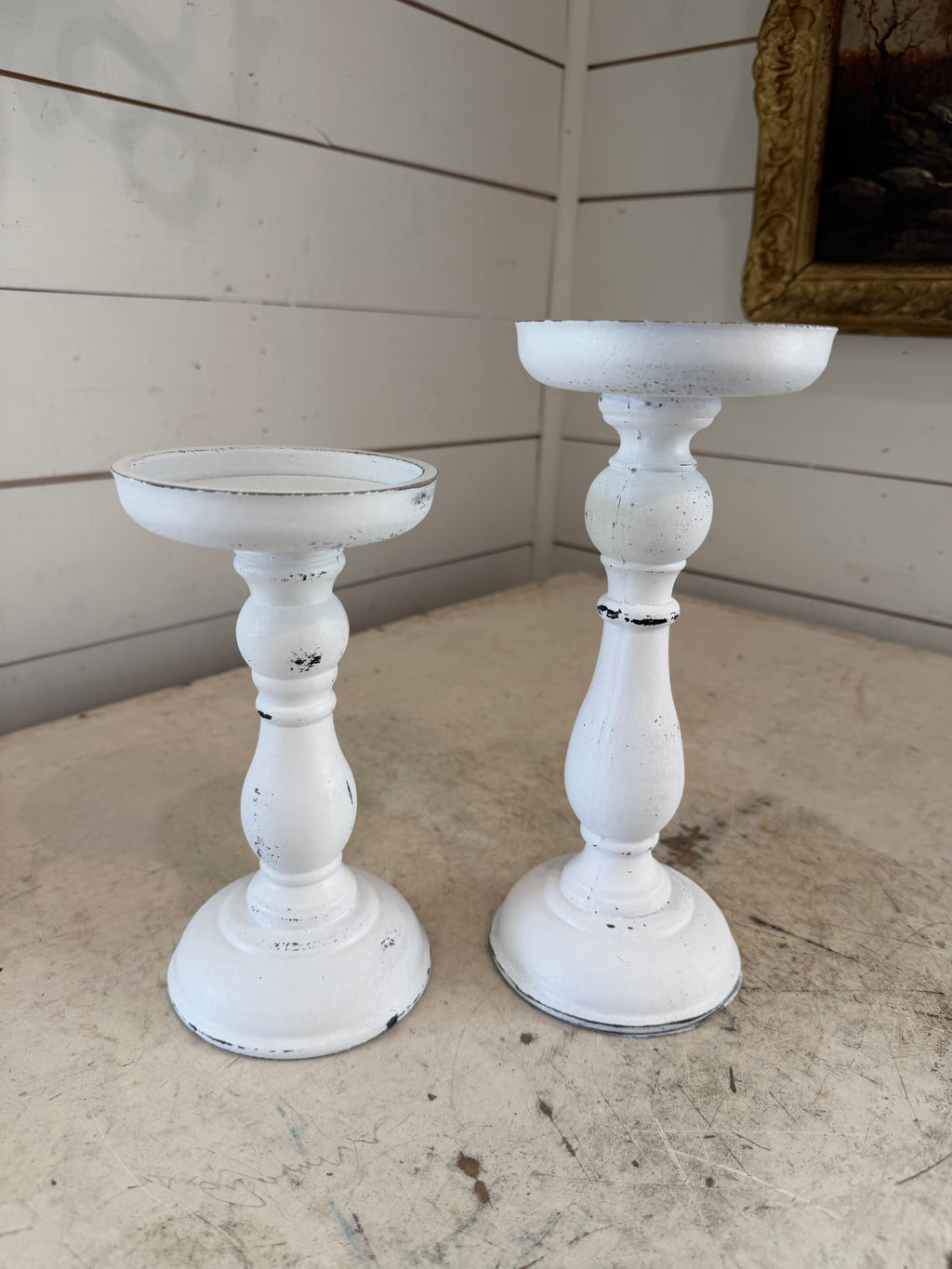 Set of white chippy candlesticks