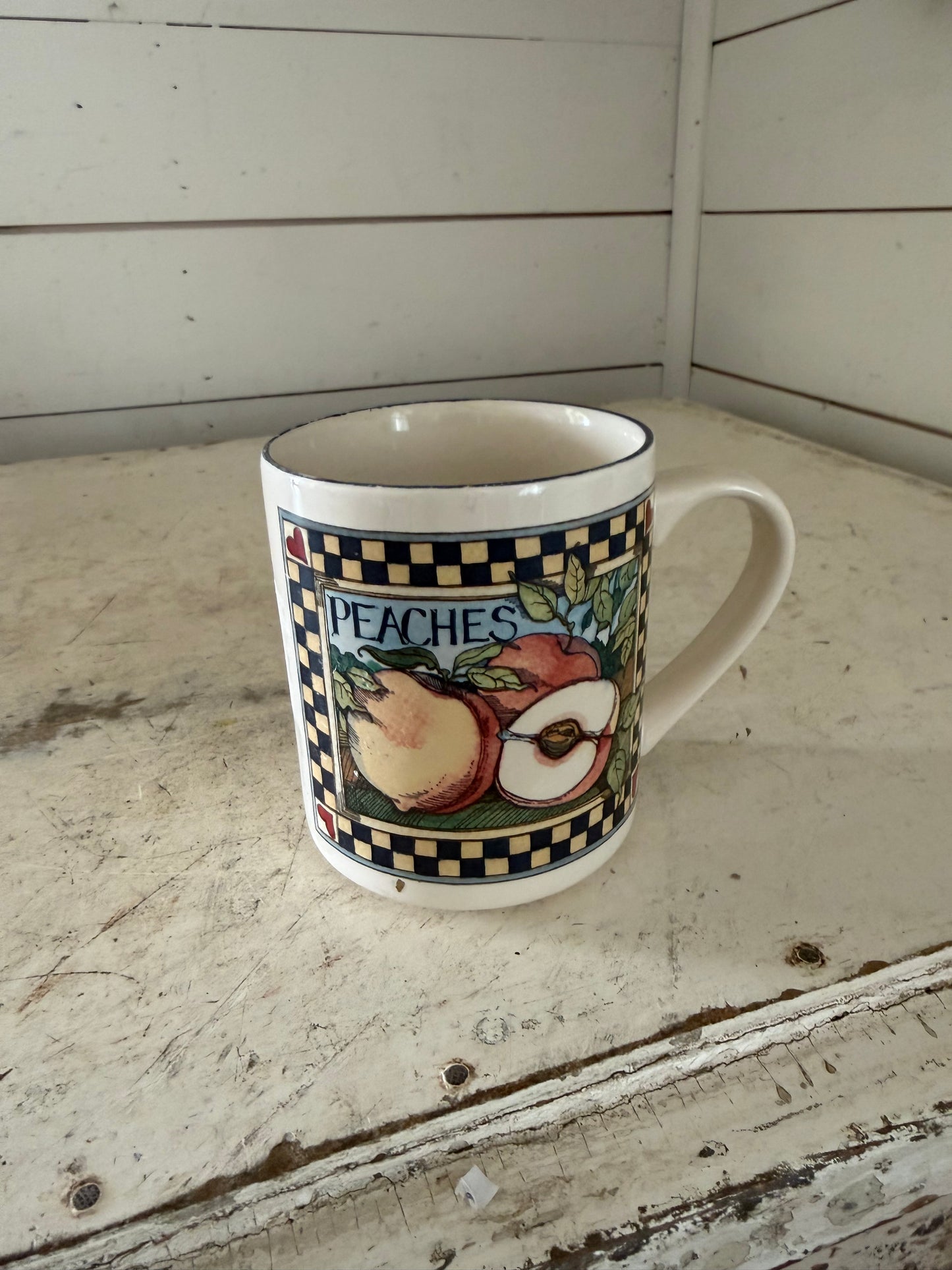 Susan Winget Ceramic Mug with Peach design