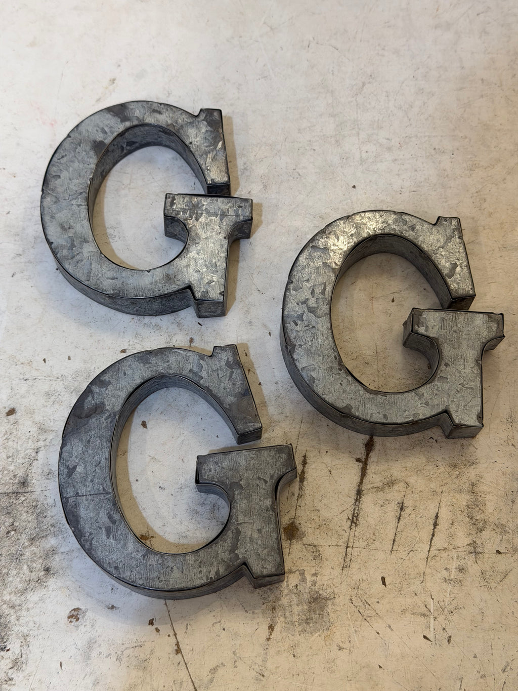 Rustic galvanized, tin letters sold individually Rusted galvanized, tin letters sold individually 3-3/4” - hanging hardware on back