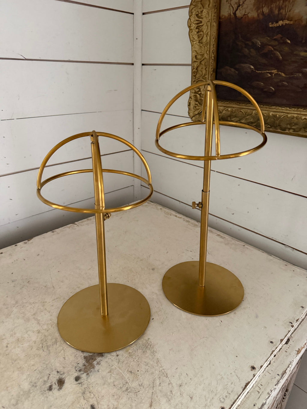Set of two brass hat displays