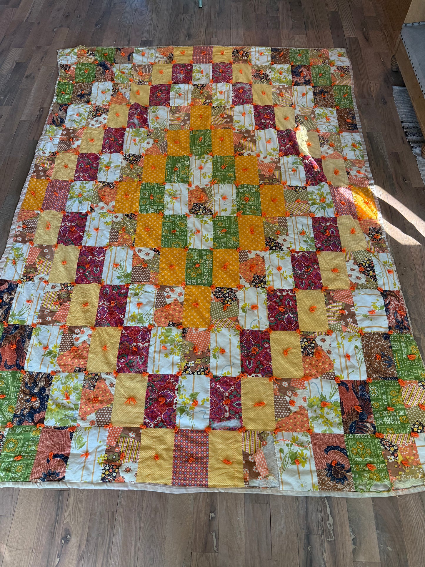 Full size hand pieces quilt in yellow, orange and green - has some wear as shown