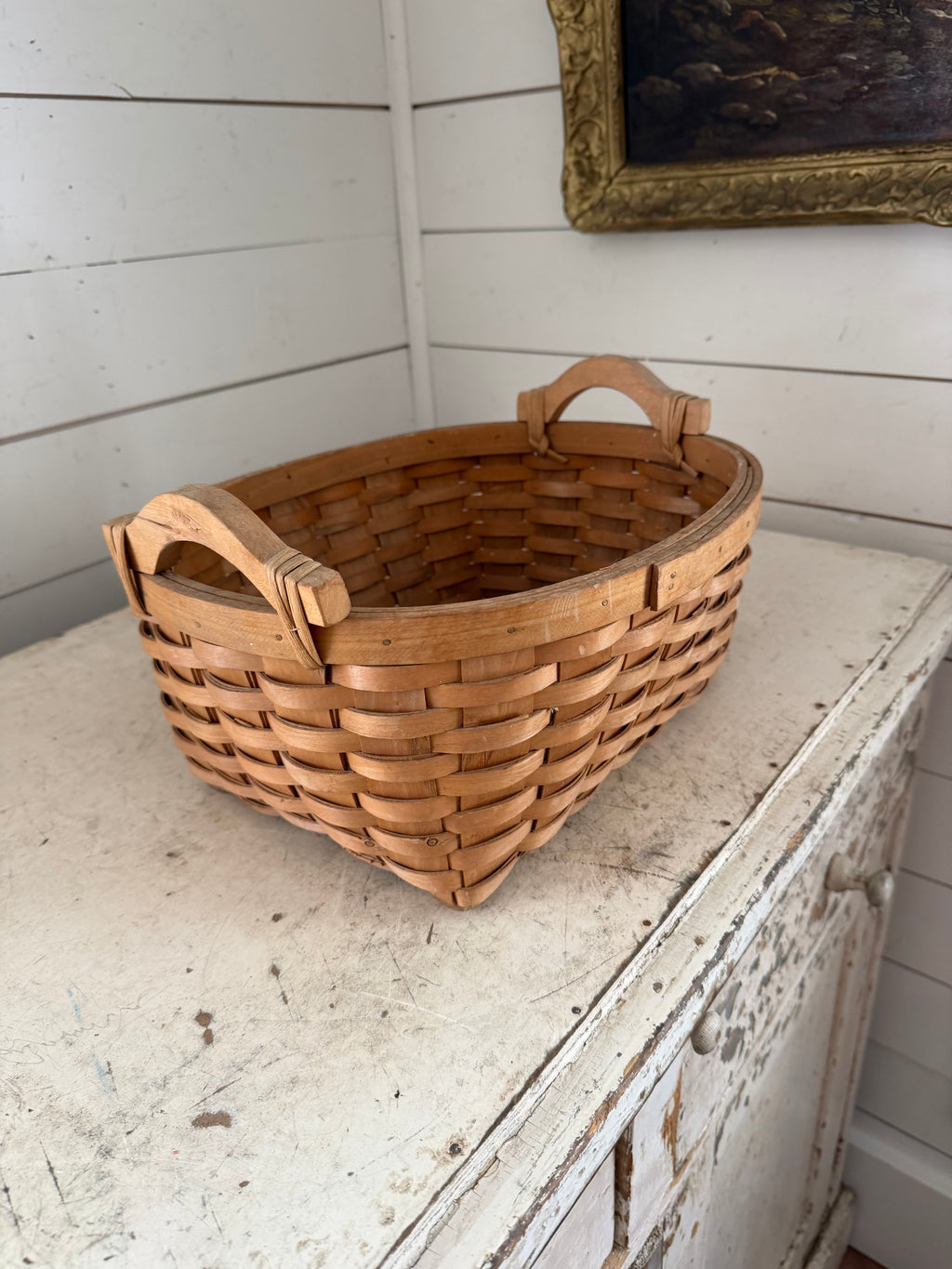 Woven basket with handles