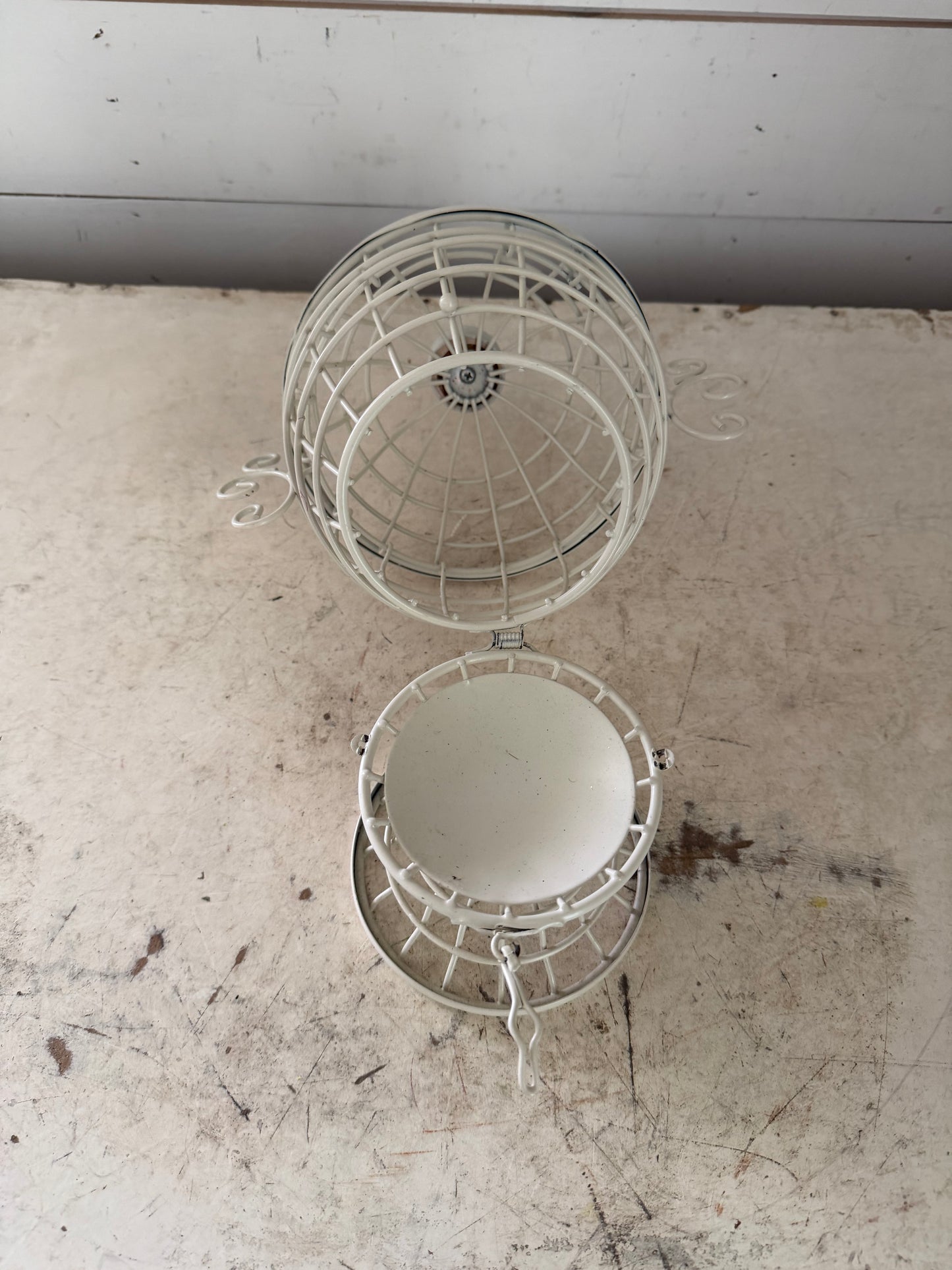 White decorative birdhouse style urn with lid