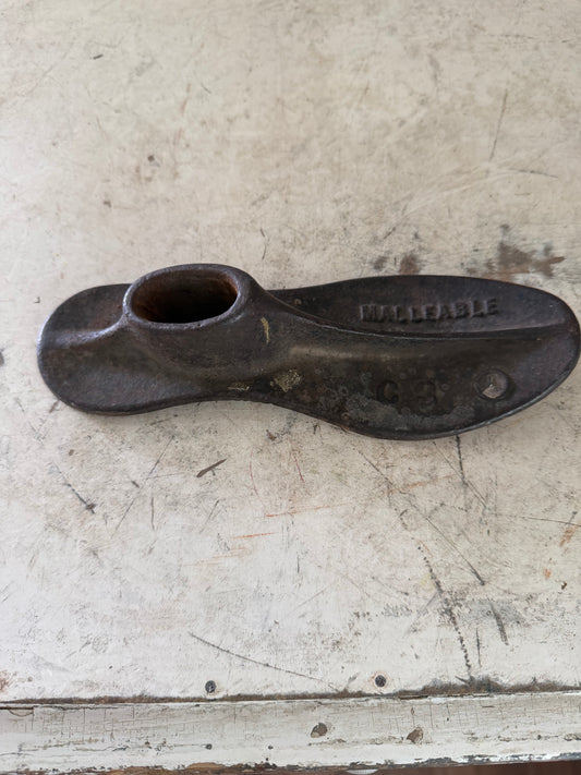 Antique cast-iron shoe last
