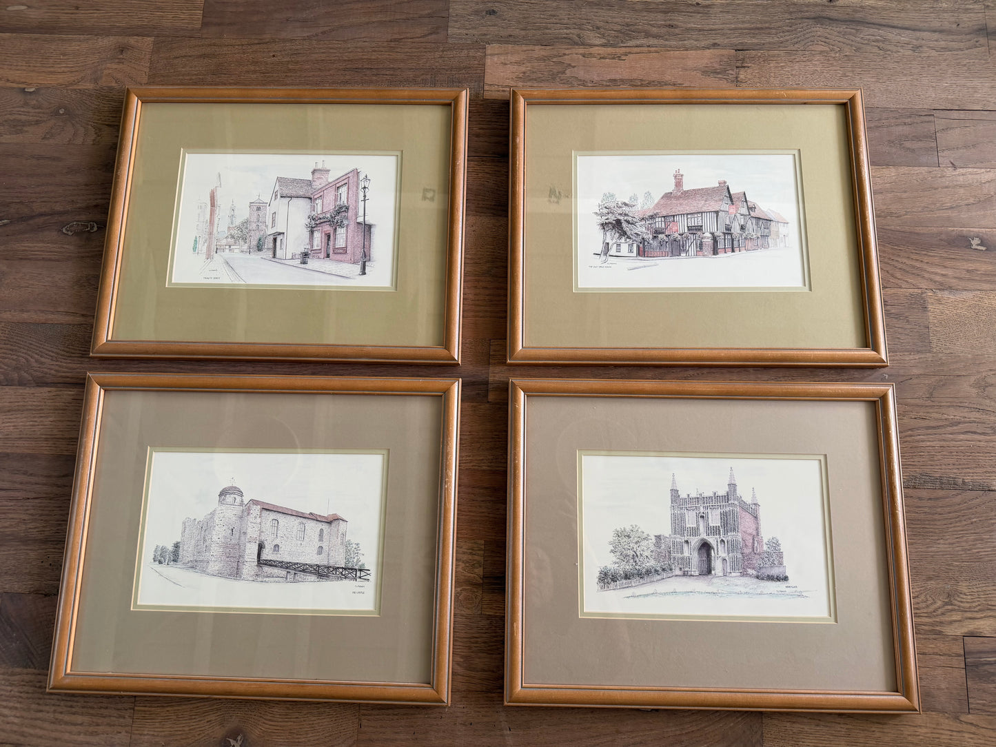 Set of four historic English buildings framed and professionally matted