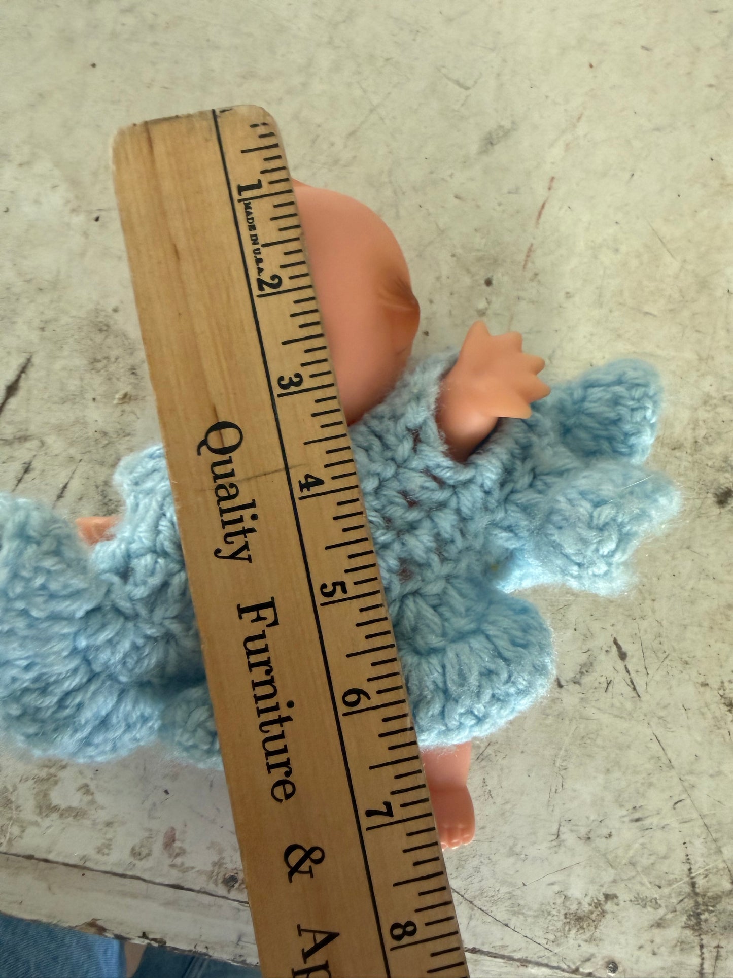 Kewpie doll with crochet dress