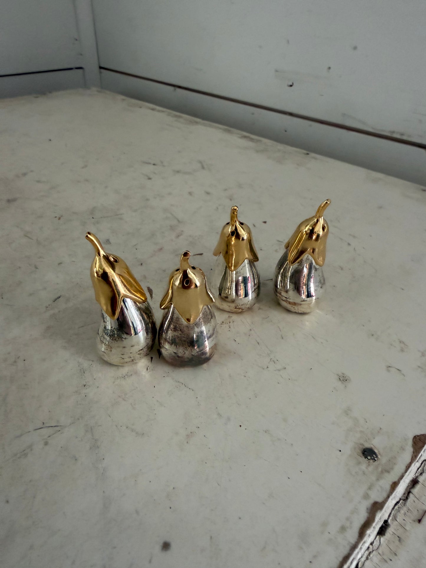 Set of silver eggplant, salt, and pepper shakers each that sold separately