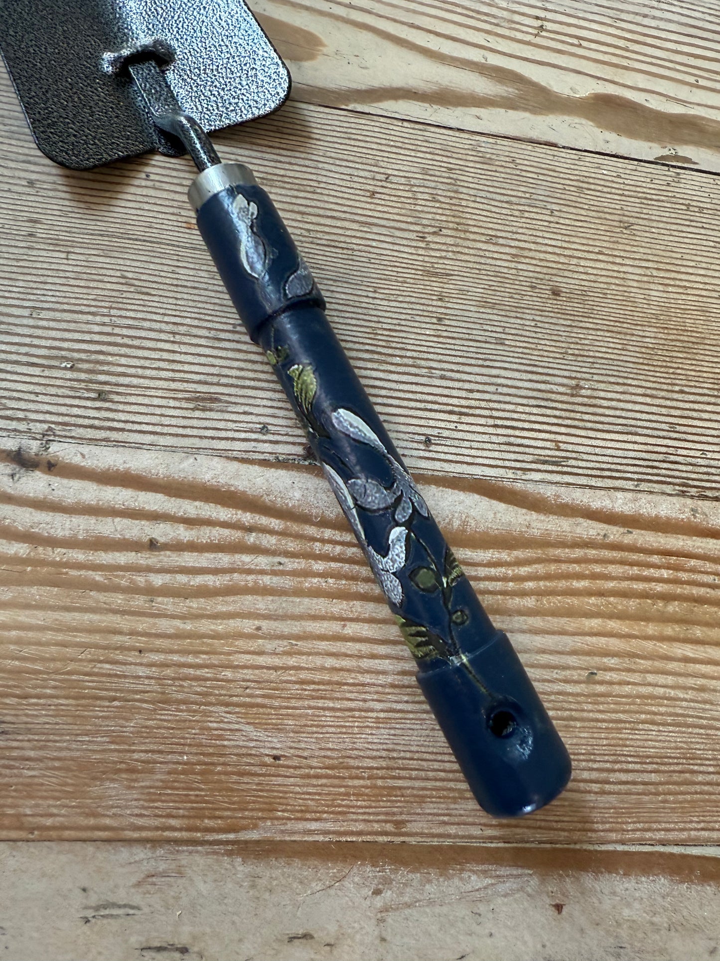 Shovel with painted handle and IOD transfer