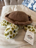 Warmies turtle - new but had a small defect that my mom sewed on the belly