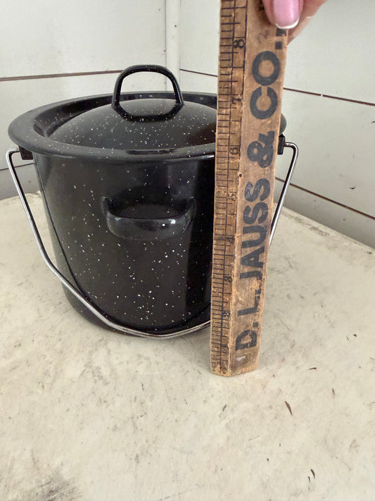 Small black enamel pot with lid
