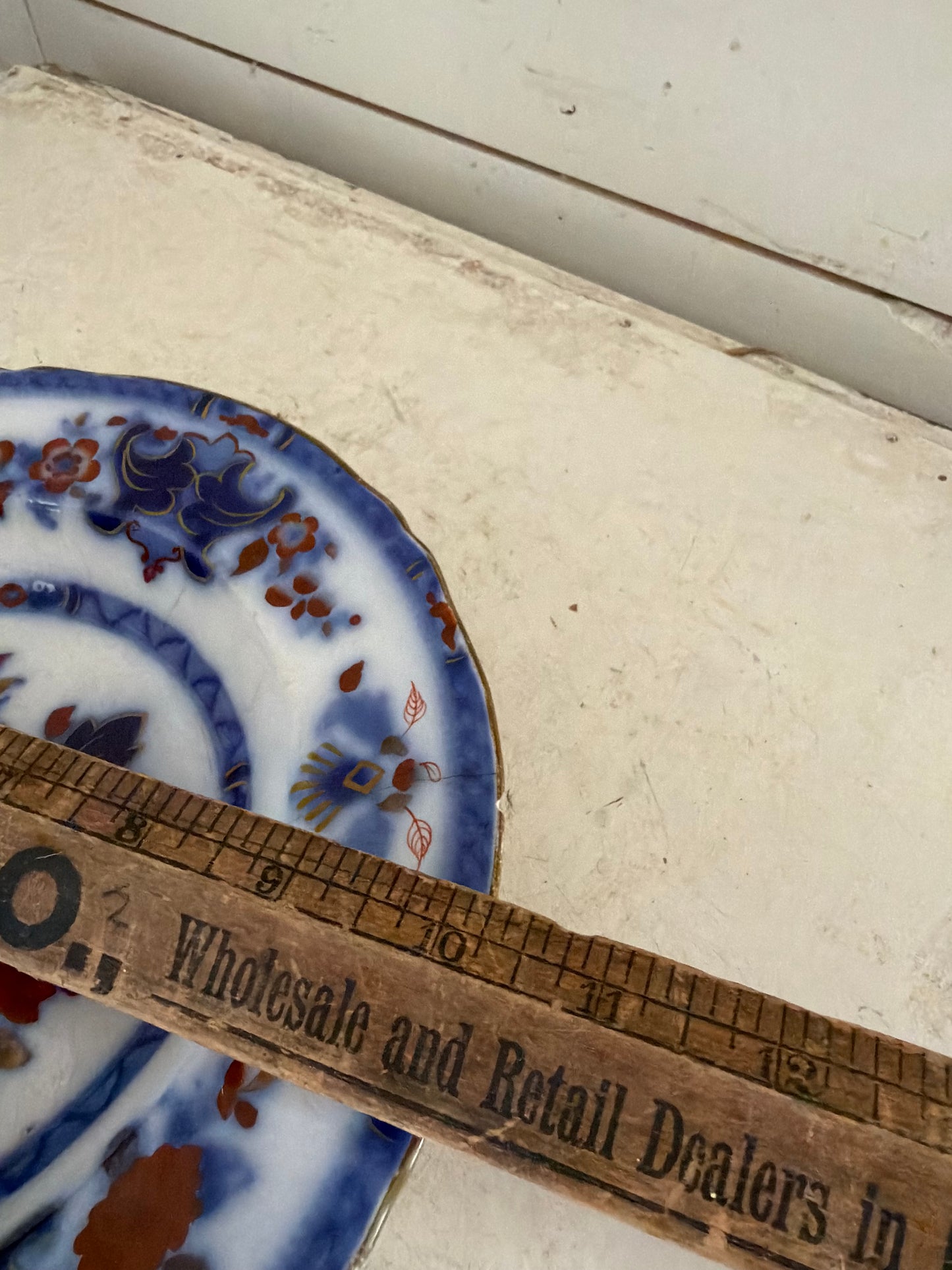 Flow blue plate made in England has small crack