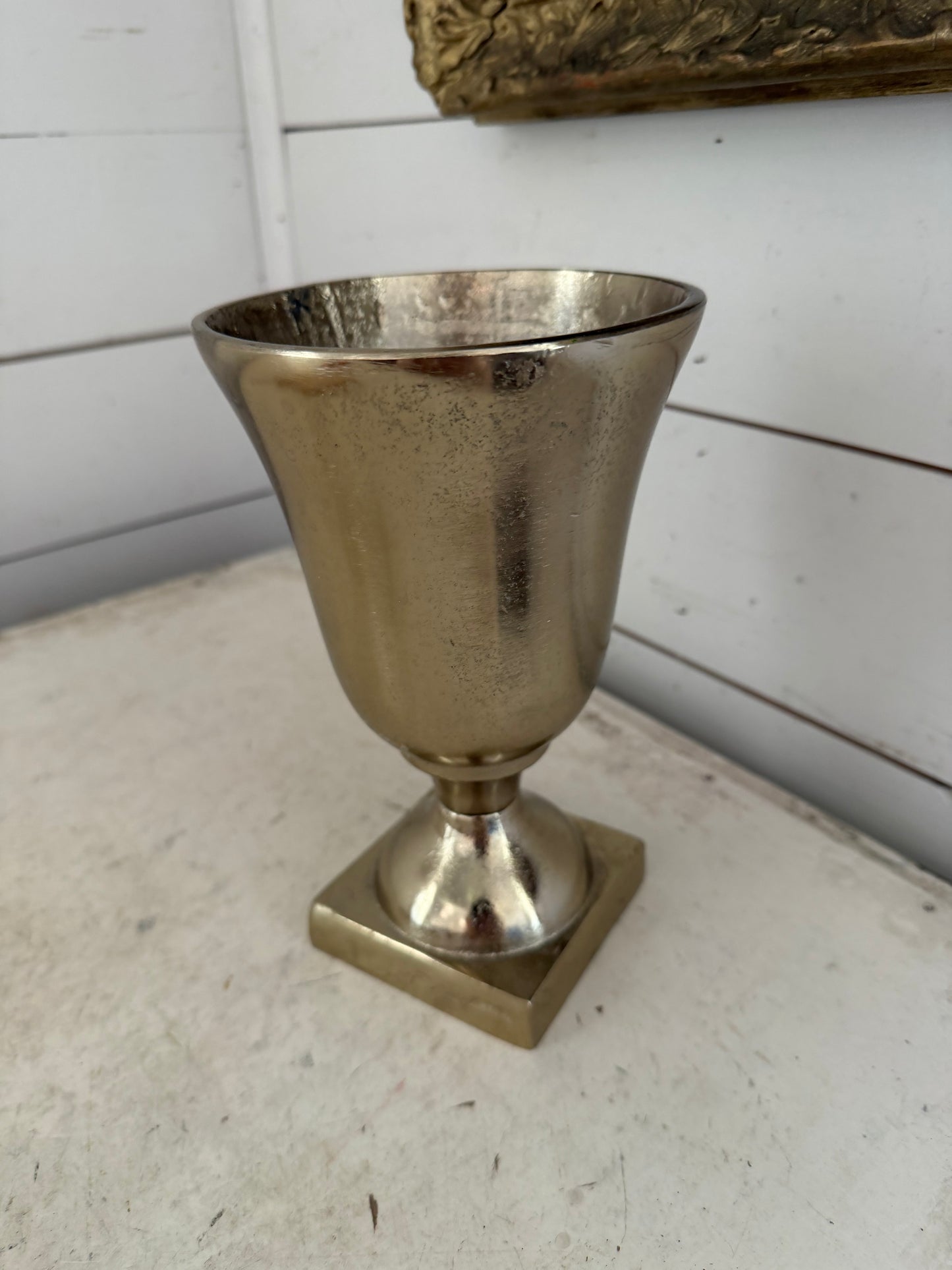 Gold tone urn