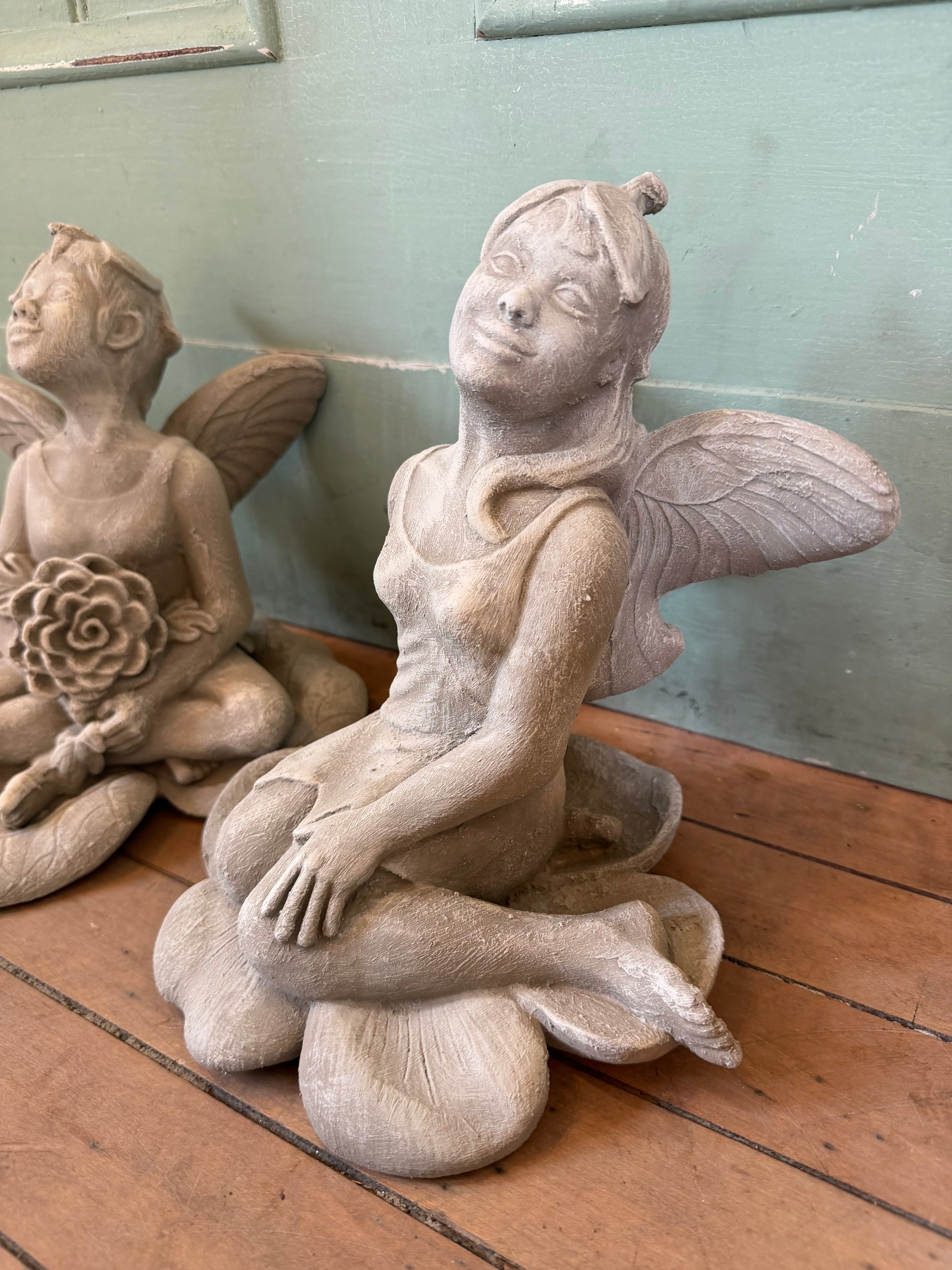 Set of garden fairies painted with exterior paint