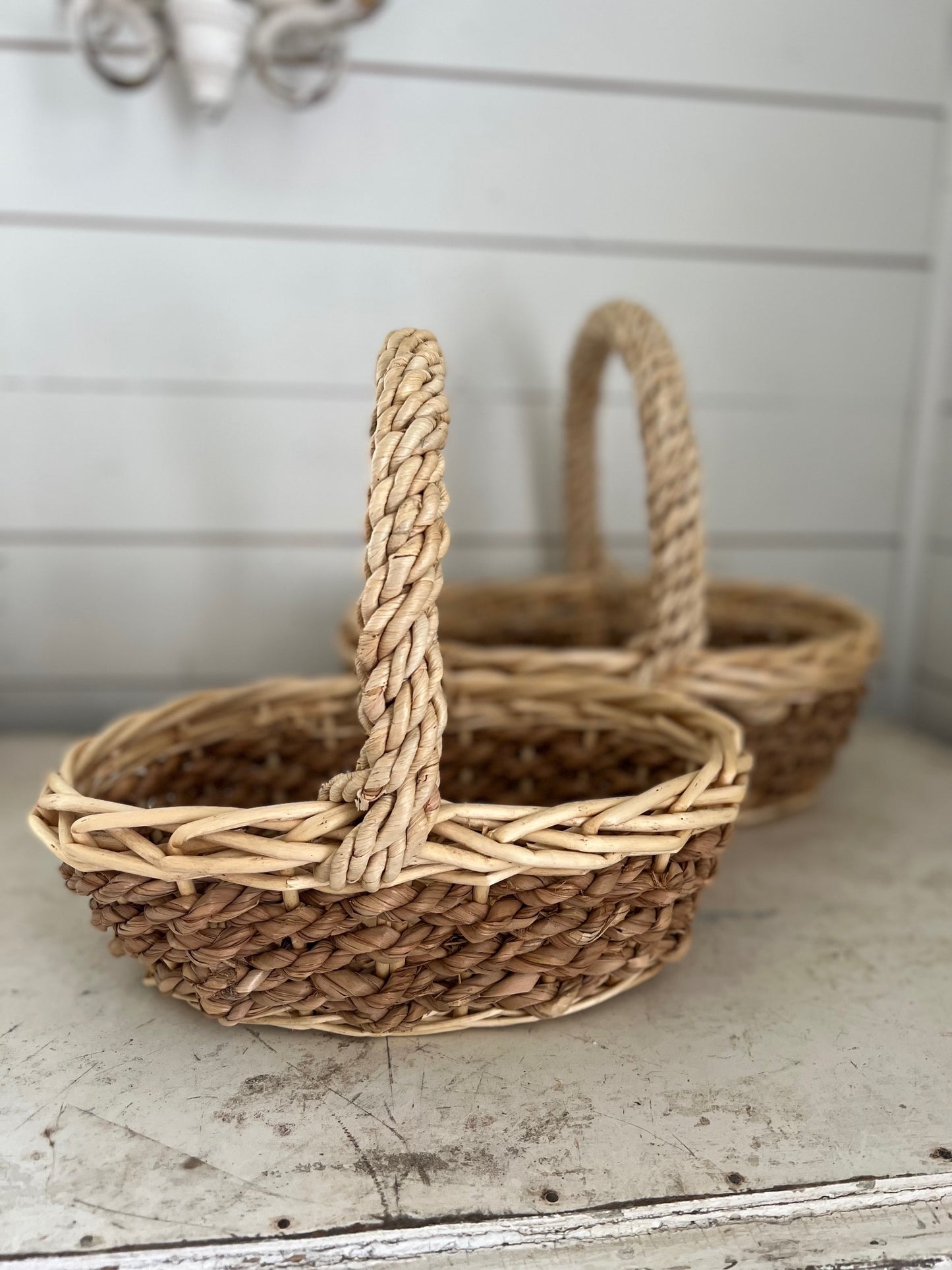 Set of stacking oval baskets with braided handle